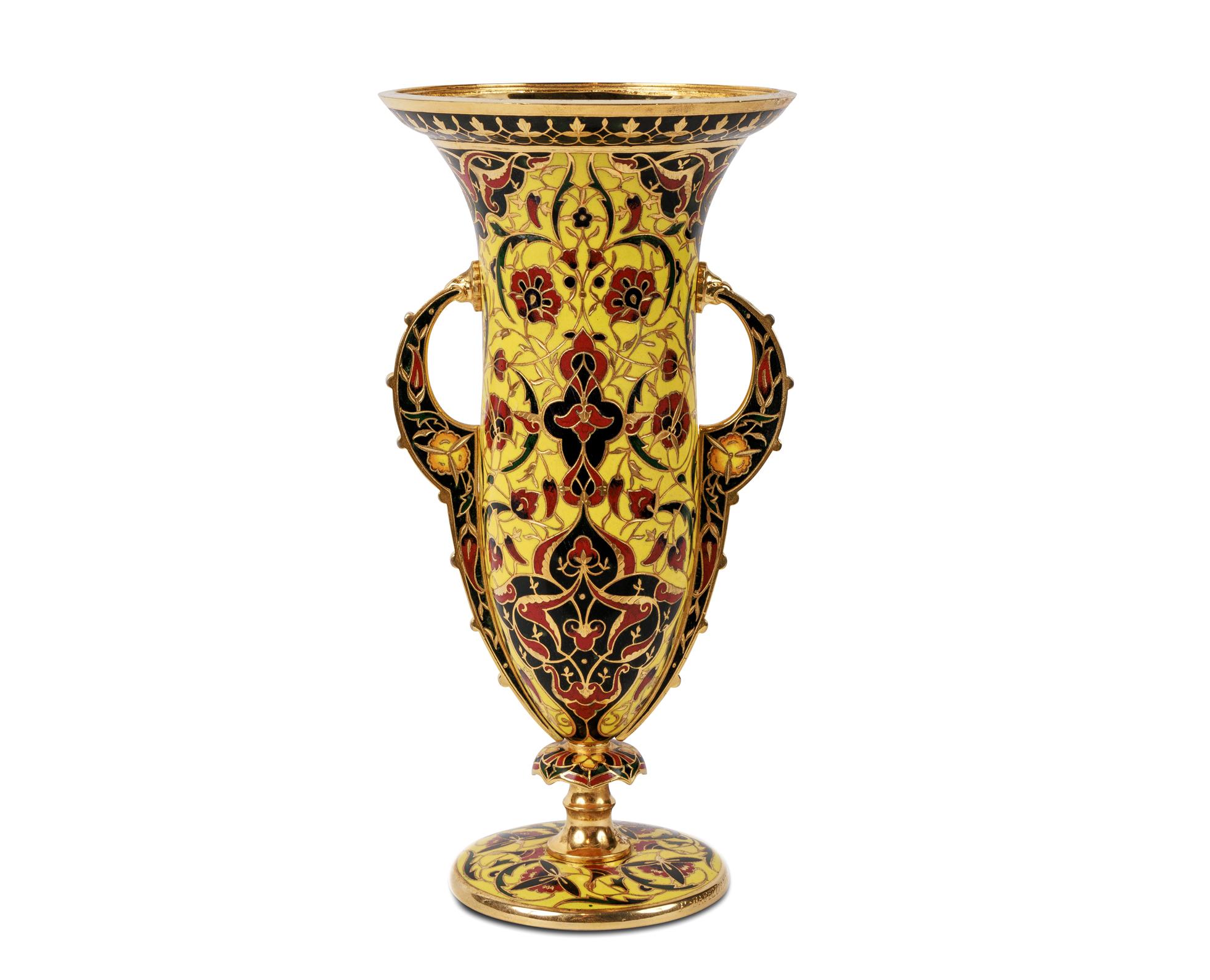 Ferdinand Barbedienne, A French Ormolu and Champleve Enamel Vase, C. 1870

In the Islamic / Alhambra taste. The two handled vase in Alhambra form, enameled in rich yellow throughout with highlights of green, red and black. 

Signed F.