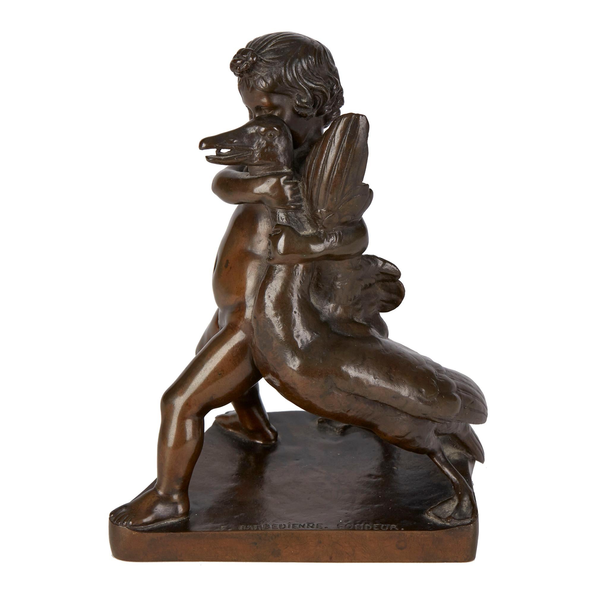 A finely patinated French antique bronze by Ferdinand Barbedienne portraying a a young boy caressing a large goose. The figure is mounted on an angled and shaped base and is signed 'F. BARBEDIENNE. FONDEUR.' to the base. French, Ferdinand