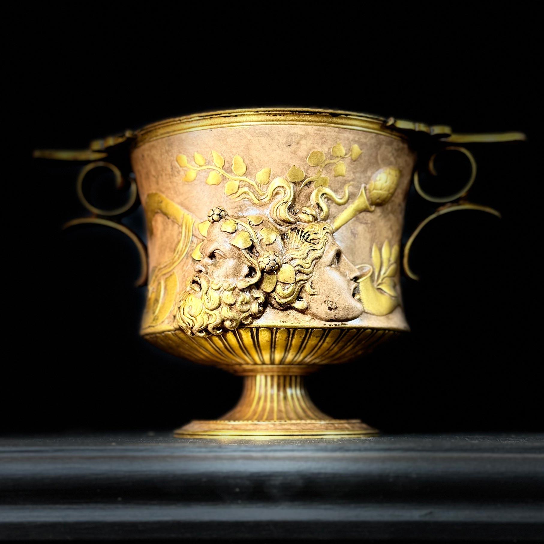Glorious 19th century gilt bronze low handled urn modelled after the original Borghese vase by Giovanni Zoffoli  (c1785-1845) cast by Barbedienne in the third quarter of the 19th century.  14.5 cm Tall and 24.5 cm Across.  

The work is