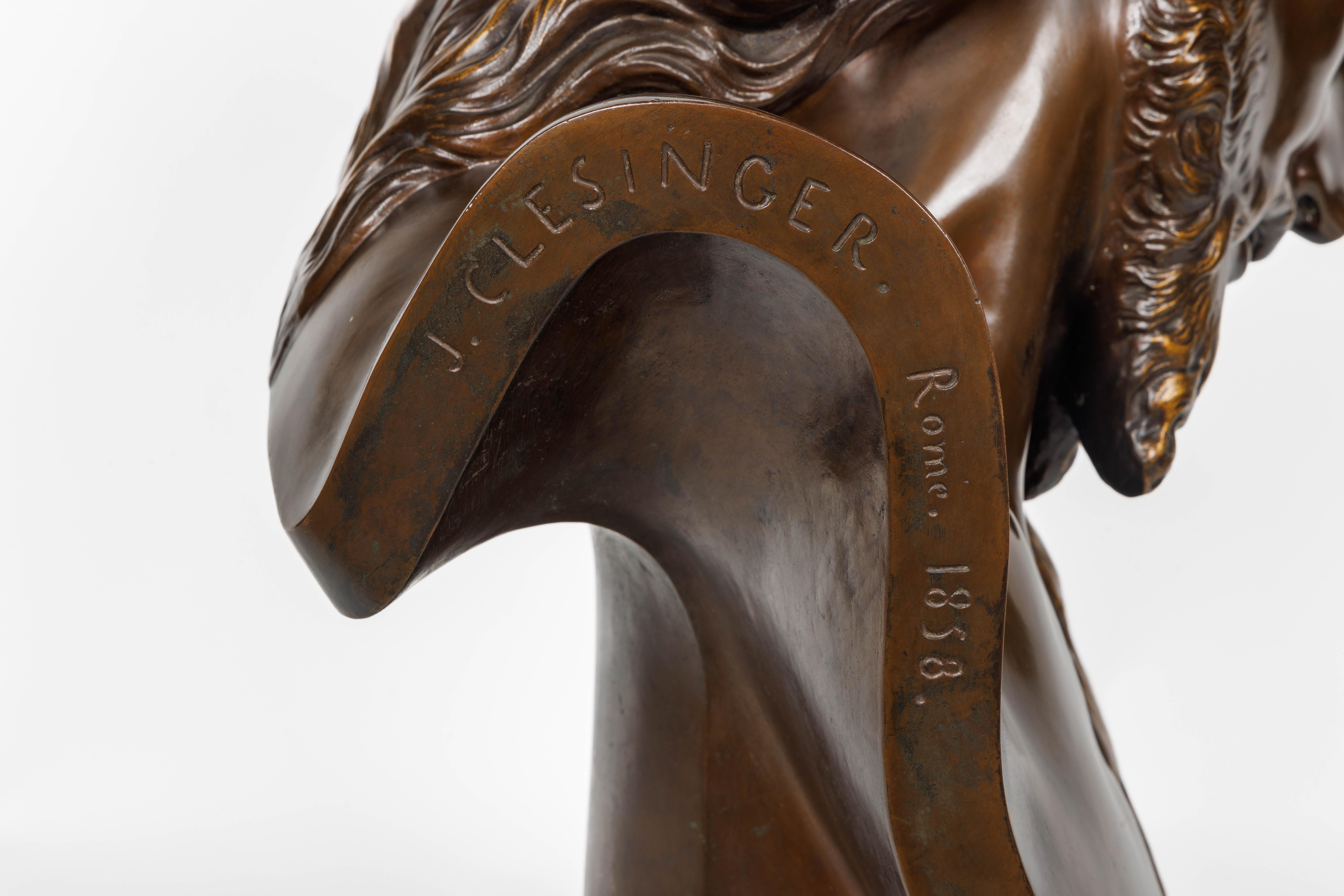 Un monumental y verdaderamente excepcional busto francés de bronce patinado de Jesucristo, circa 1858, firmado J. Clesinger, Roma 1858 & F. Barbedienne Fondeur

Este monumental y extraordinario busto francés de bronce de Jesucristo, realizado hacia