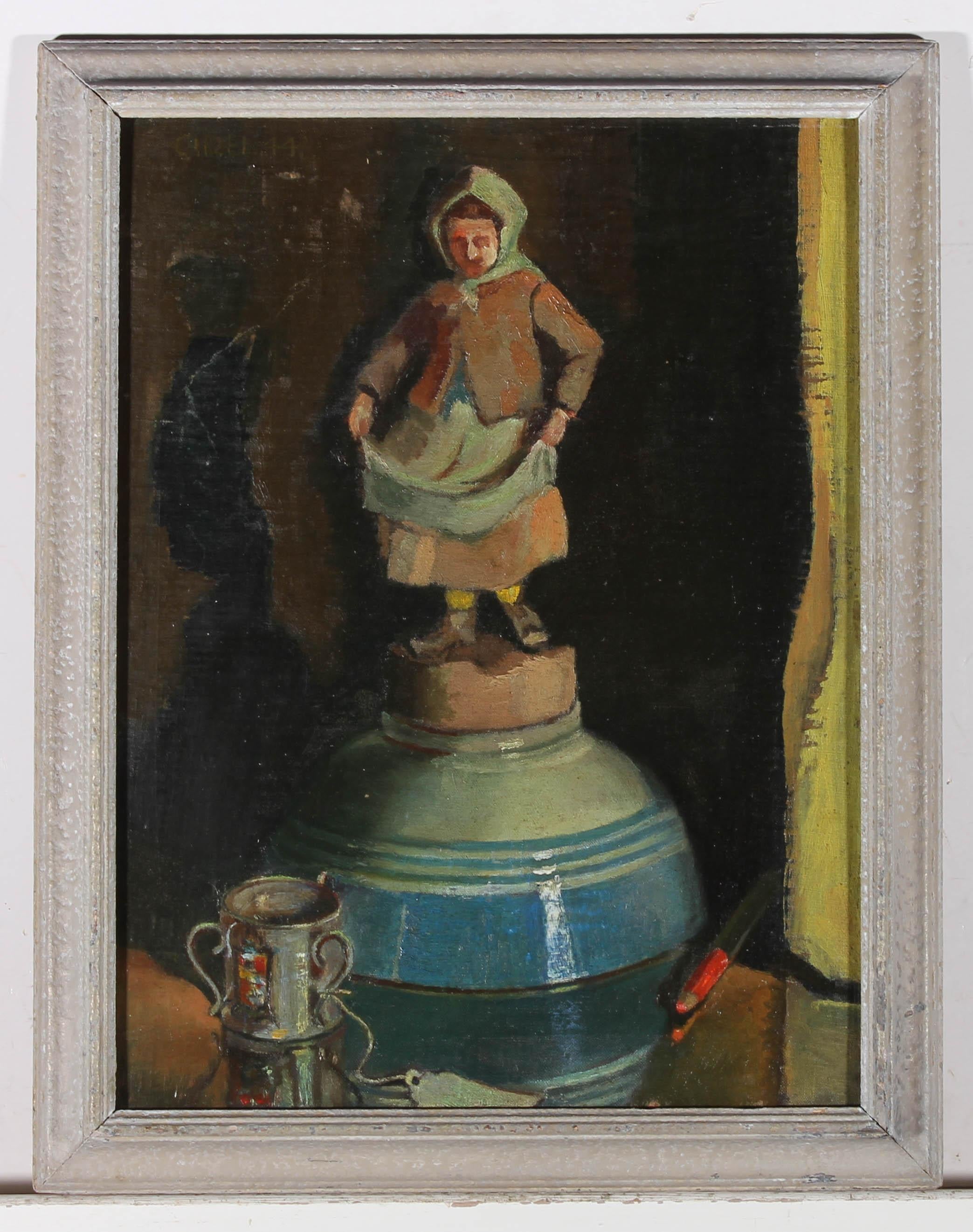 A fine example of Mid Century painting, this still life shows a collection of unusual antiques. There is a little doll standing on top of an upturned bowl with three handled tyg cup in front. A vibrant red pencil adds a splash of colour to the