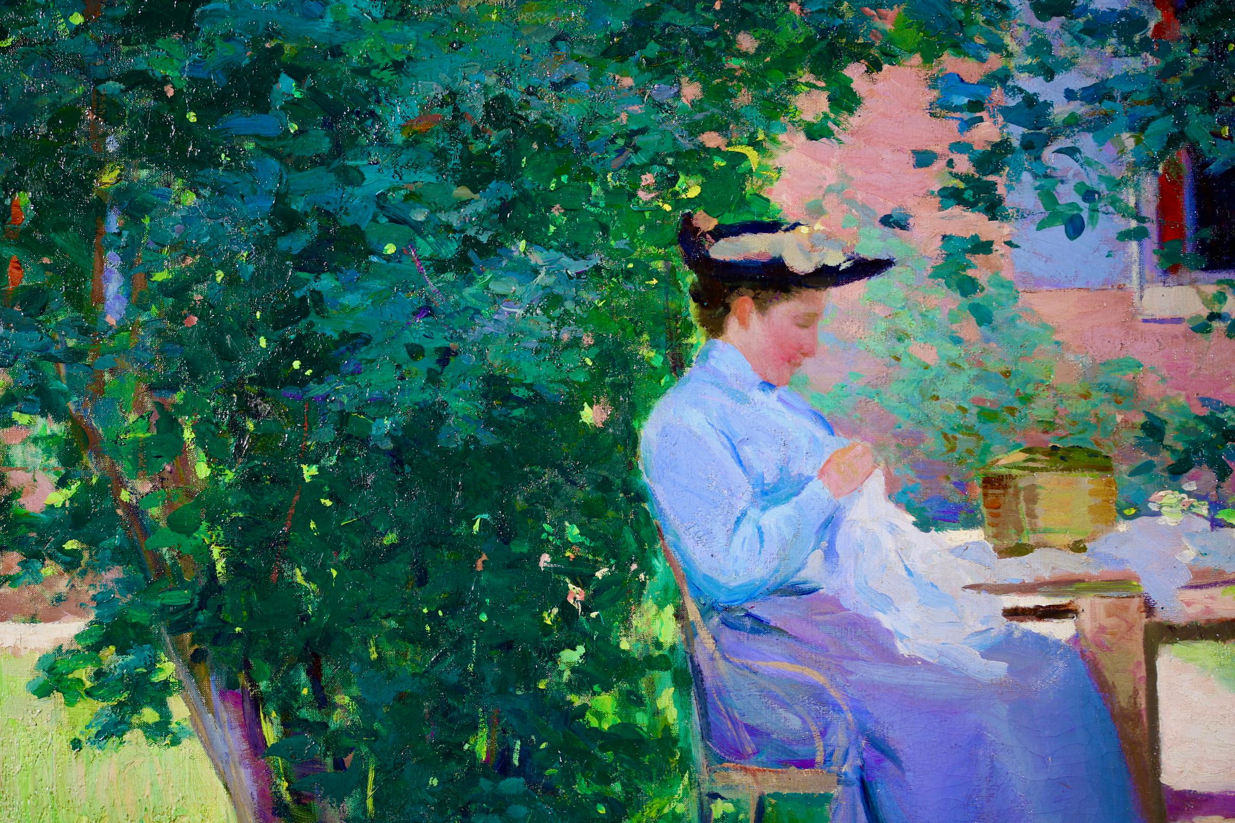 A stunning large oil on canvas circa 1900 by French painter Ferdinand Deconchy. The work depicts two seamstresses dressed in blue blouses and skirts seated in a garden in the shade of trees as they sew. Deonchy was close friends with both Monet and