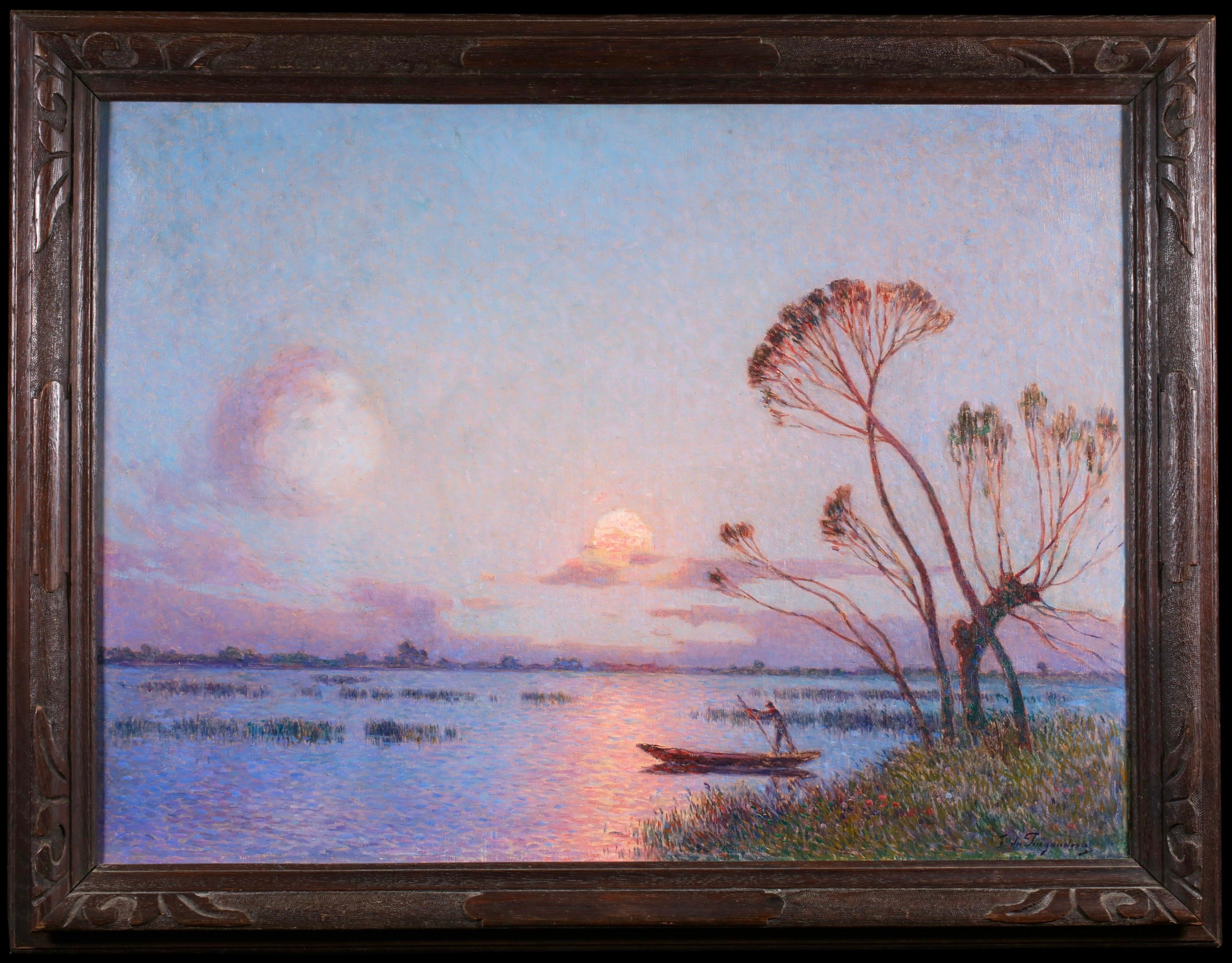 Signed post impressionist riverscape oil on canvas circa 1910 by French painter Ferdinand du Puigaudeau. The work depicts a view of La Briere - a wetland region in France - by moonlight. There is a lone man on a punt in beside the grassy