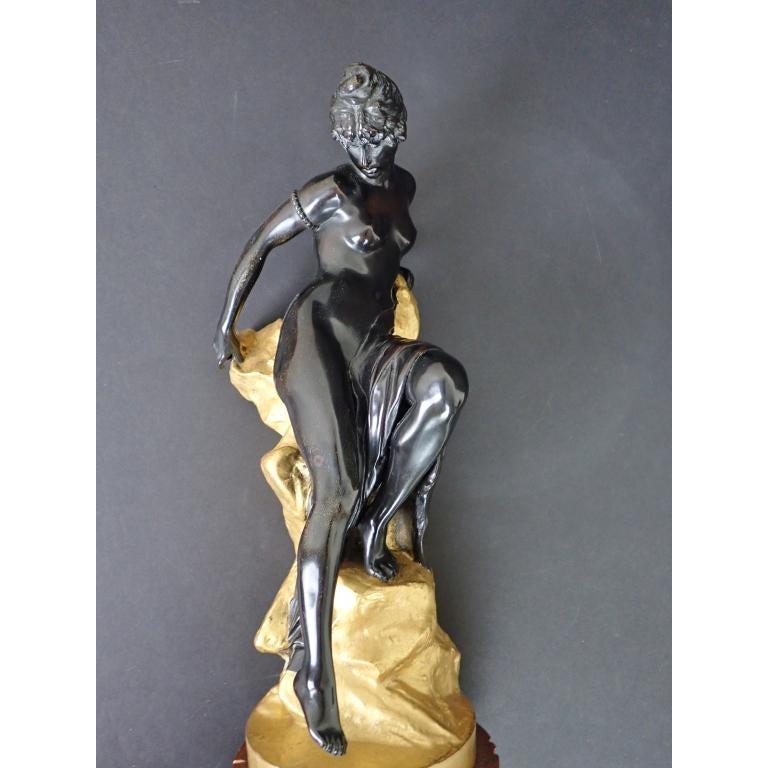 Ferdinand Lepcke doré and patinated bronze nude late 19th century antique. Lovely patinated and gilt Art Nouveau bronze of a nude bather. Mounted on marble base.

Signed: F. Lepcke.
Foundry Mark: Austria.
Ferdinand Lepcke (1866-1909).