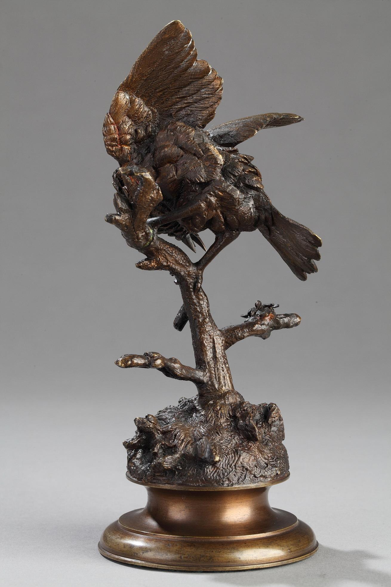 Bird on a branch
by Ferdinand PAUTROT (1832-1874)
 
Bronze with a nuanced old gilded and brown patina
Signed on the base 