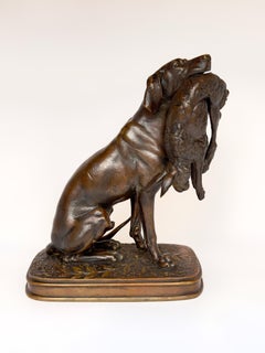 Chien assis tenant un lièvre - Bronze de Ferdinand Pautrot, 19e siècle, signé