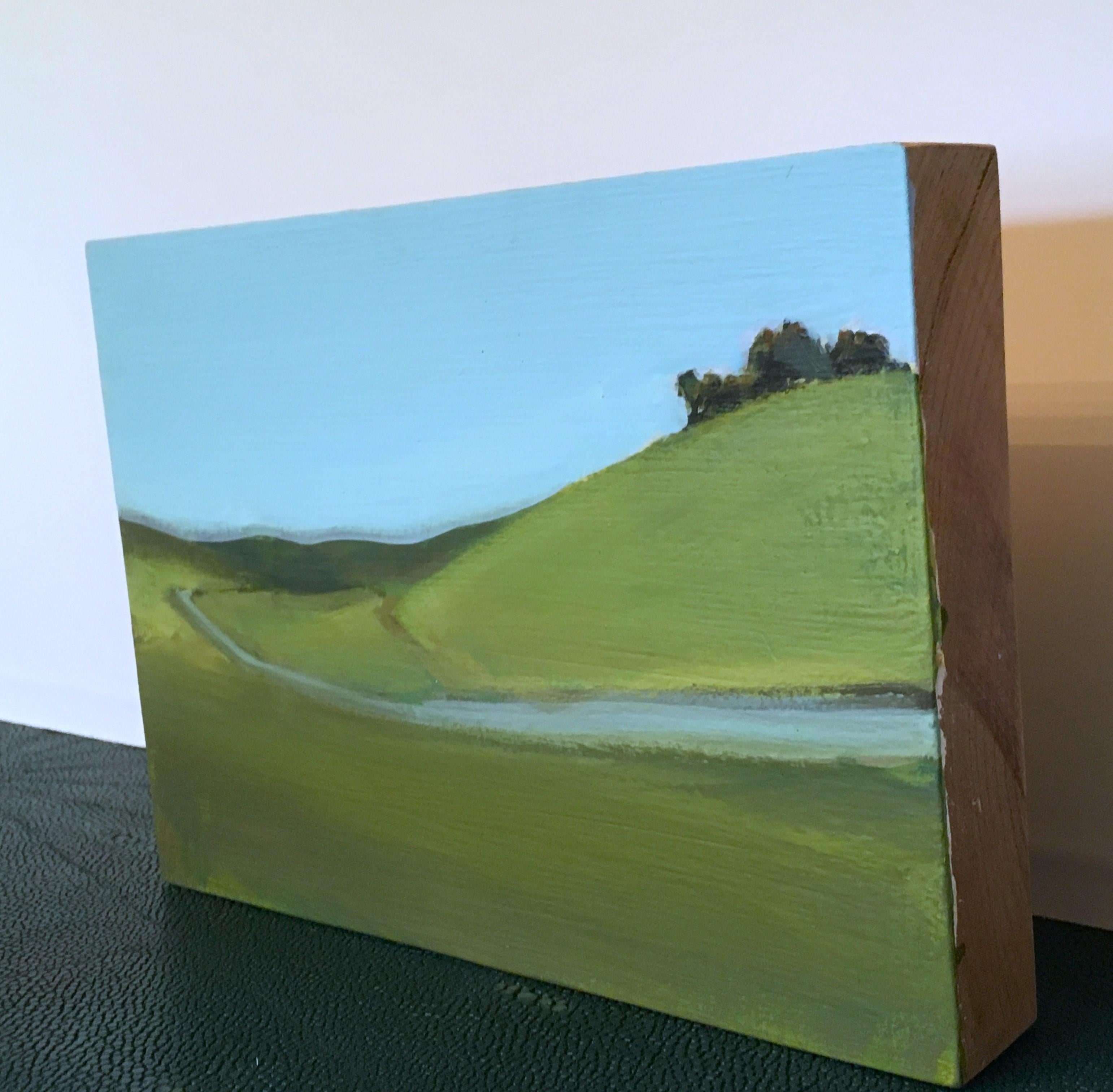 Uphill No. 1 est un paysage herbeux peint par l'artiste californien Ferdinanda Florence.  Il s'agit d'une peinture acrylique sur bois.  Il mesure 8,5 x 9,5 x 2.  Il est rempli de bleus,  vertes et brunes.  Un paysage rempli d'arbres, d'herbe et
