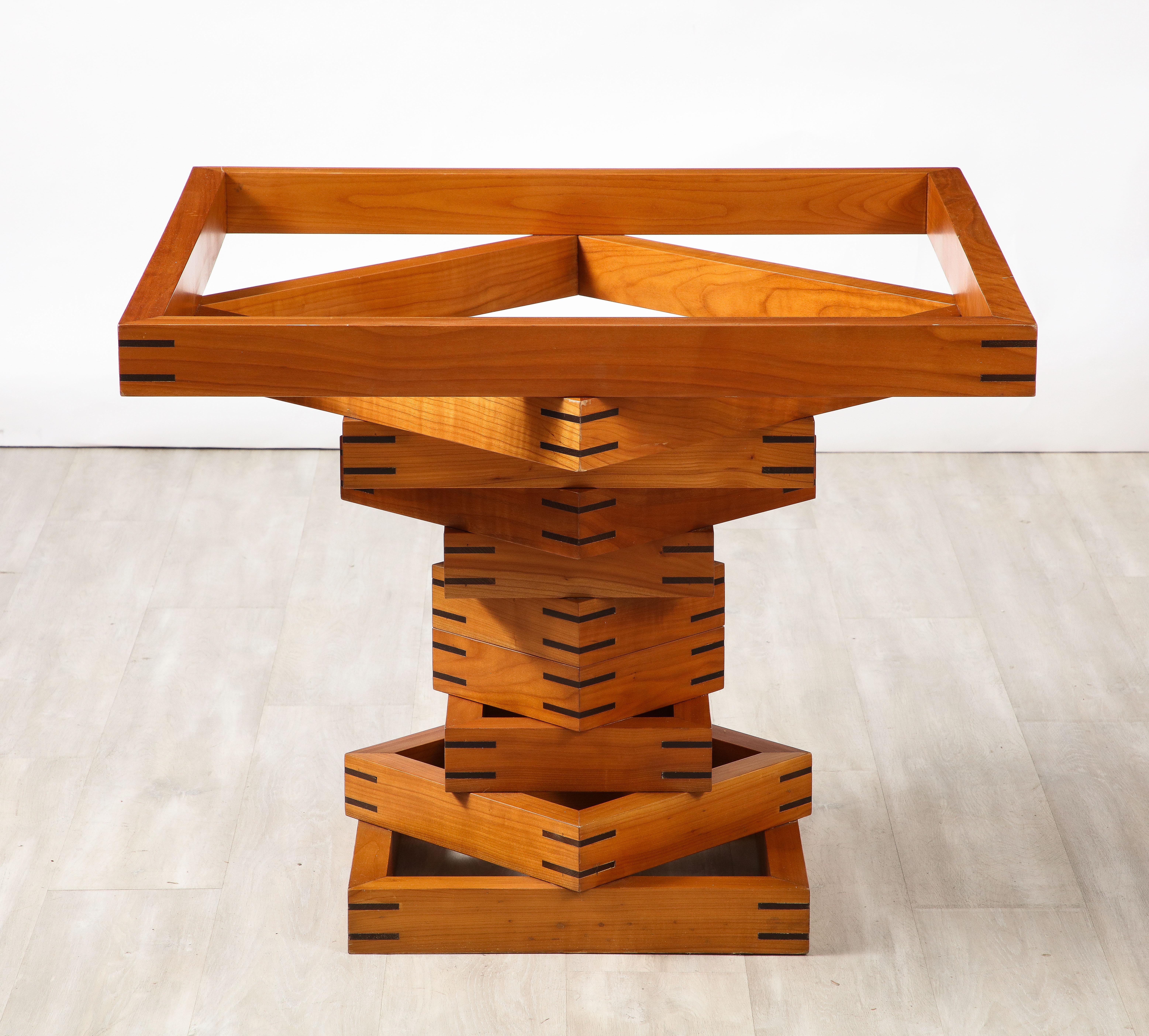 Dining Table Model “Corinto” by Ferdinando Meccani, Italy 1978

The “Corinto” dining table, designed by Ferdinando Meccani for Meccani Arredamento in 1978 was created in tandem with the sideboard that bears the same name. The base of this table