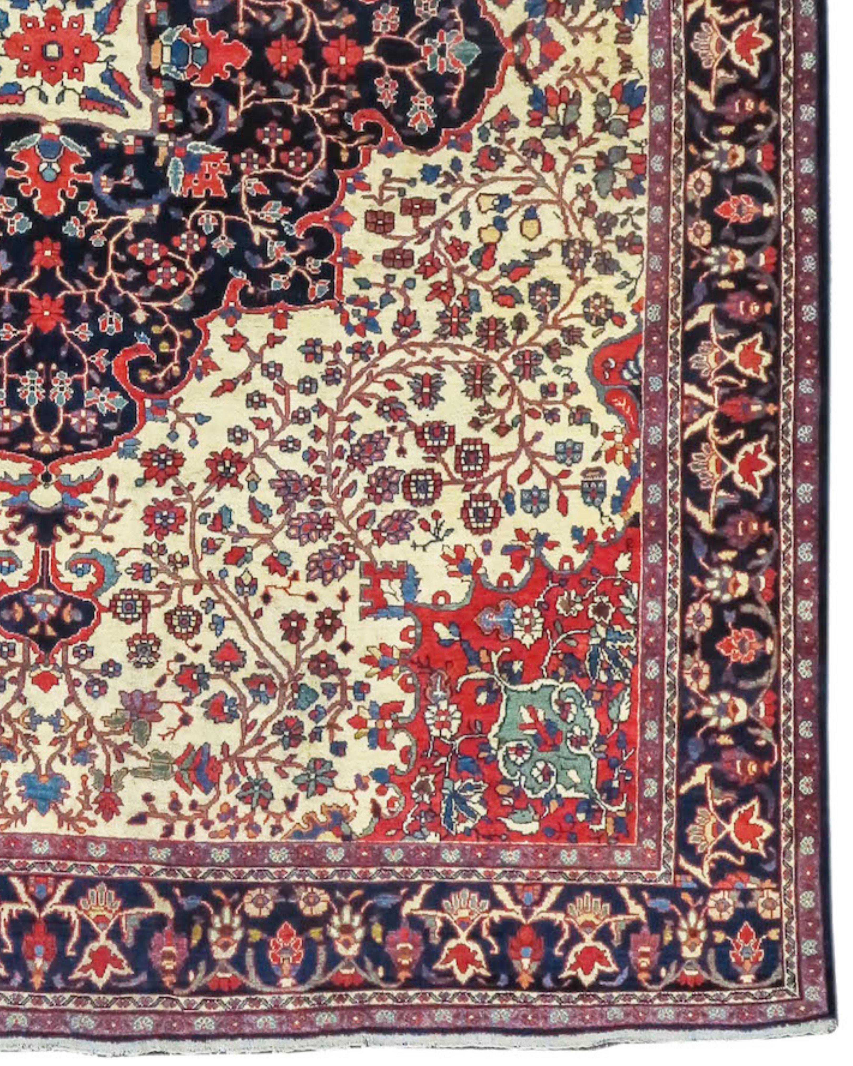 Fereghan Carpet Rug, circa 1900

Delicate networks of blossoming vine-scroll meander through both the field and central medallion of this fine Fereghan Sarouk carpet from central Persia. This is a masterfully balanced piece with light complimenting