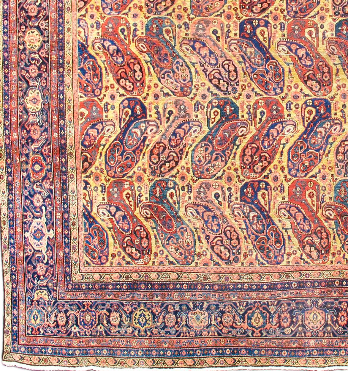 Antique Persian Fereghan Carpet, Late 19th Century

In the manner of a fine Persian shawl, this splendid Fereghan carpet draws rows of elegant paisley clusters throughout its field. Color is superb and lively and includes a particularly pleasing