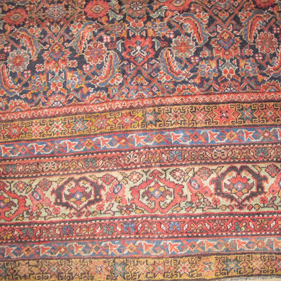 Antique Large Oversized Persian Fereghan Long Rug, 19th Century

Using a veritable rainbow of colors, a classic “Herati” design is drawn delicately in a small scale against the indigo ground of this Central Persian Fereghan carpet. With just the