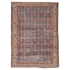 Ferehan with a Navy Field and Raspberry, Ivory, Madder Red and Jade Tones c.1900