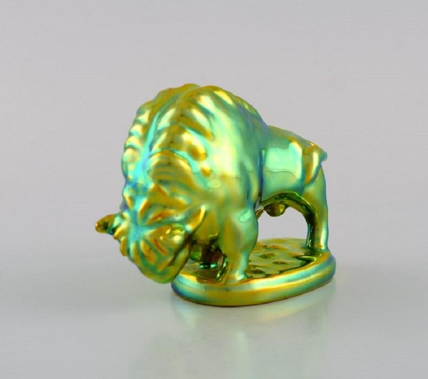 Ferenc Ory for Zsolnay. Bison in glazed ceramics. 
Beautiful eosin glaze. Late 20th century.
Measures: 9.5 x 7 cm.
In excellent condition.
Stamped.