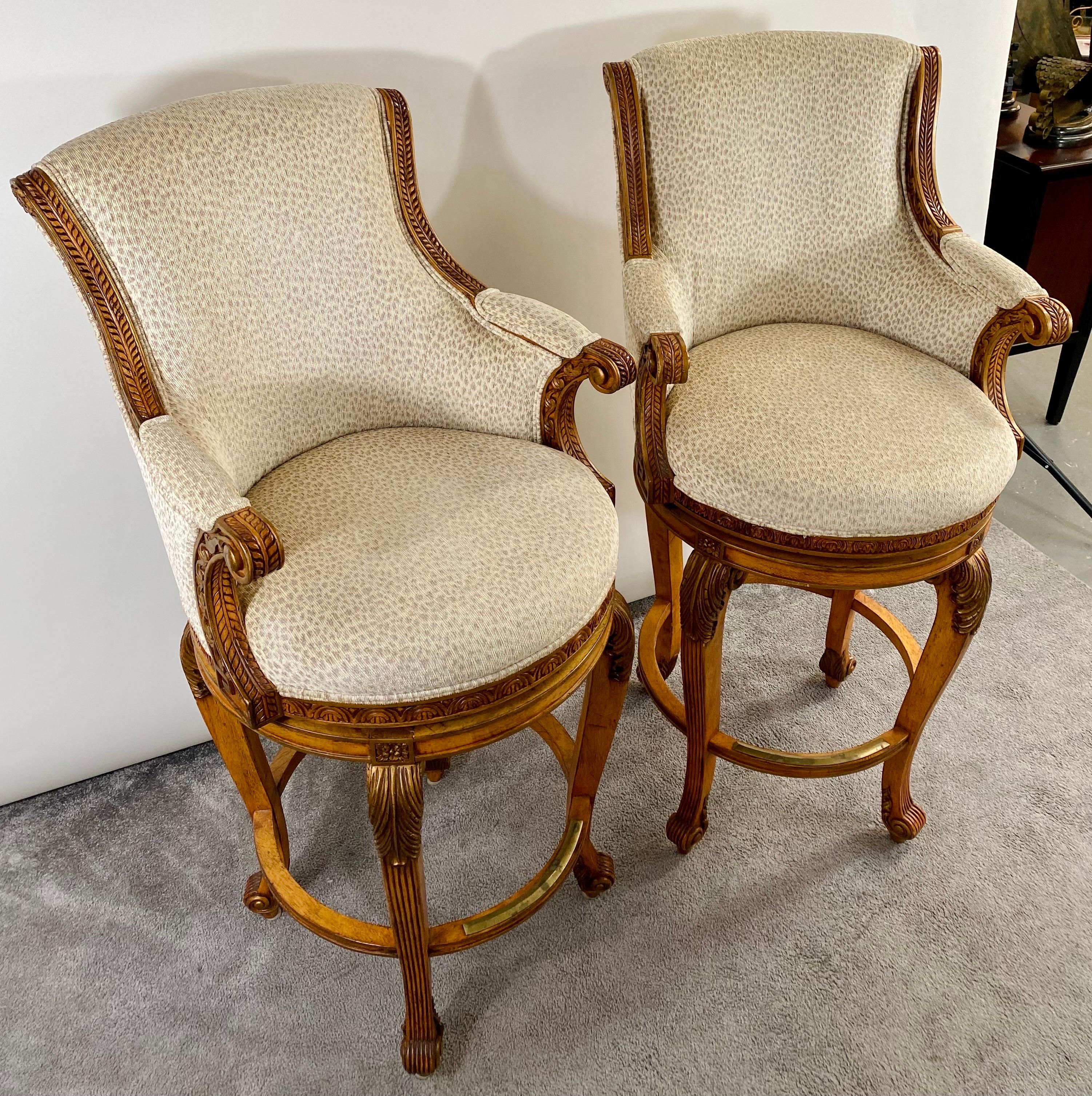 A quality and elegant  pair of hand-carved Italian provincial / regency style bar stools made by the fine furniture maker and designer Ferguson Copeland Ltd from North Carolina.  Each stool is finely carved and shows beautiful scroll and geometrical