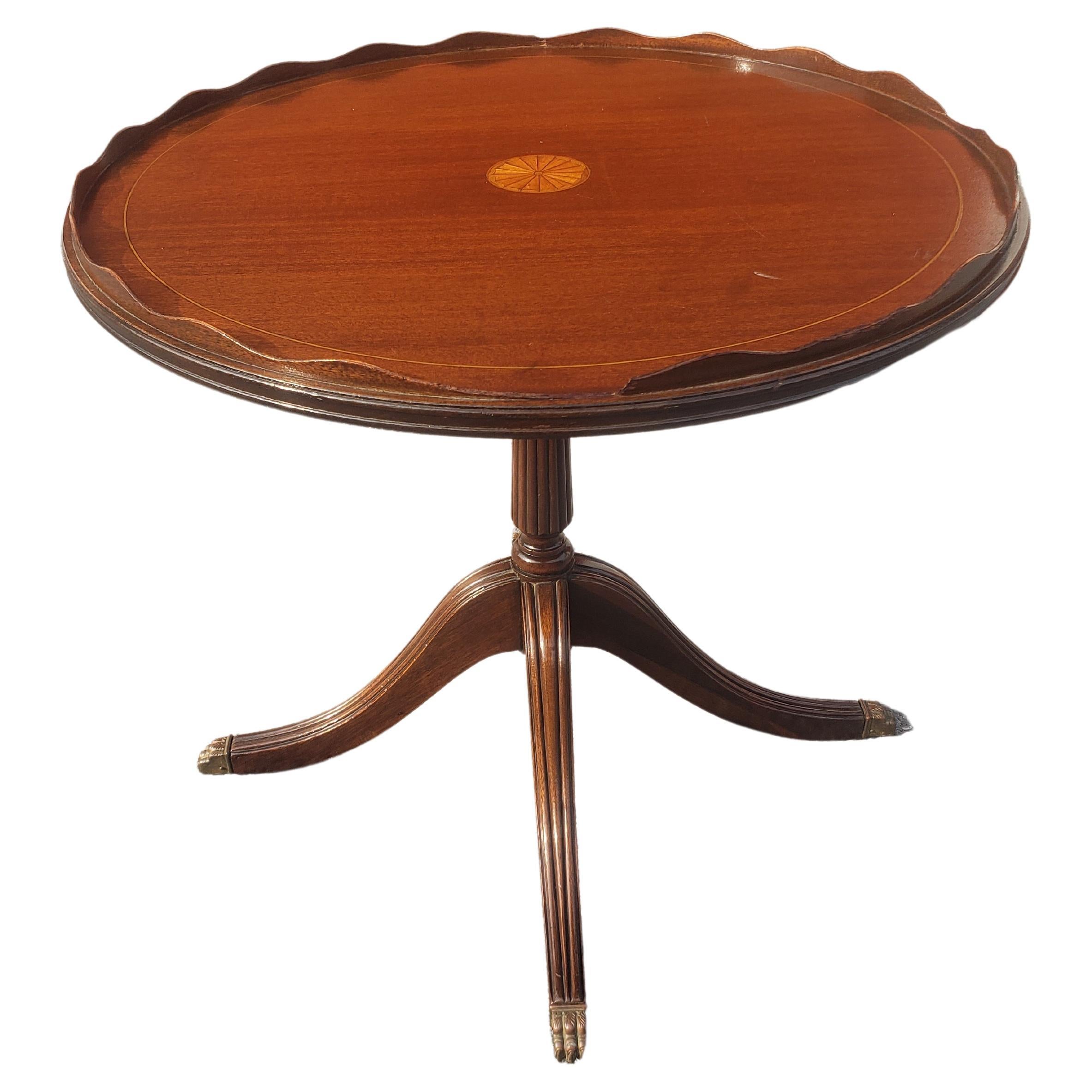 Early 20th Century Ferguson Brothers Mahogany Inlaid quadpod Pedestal Galleried Side Table with Brass paw feet.
Measures 22.5