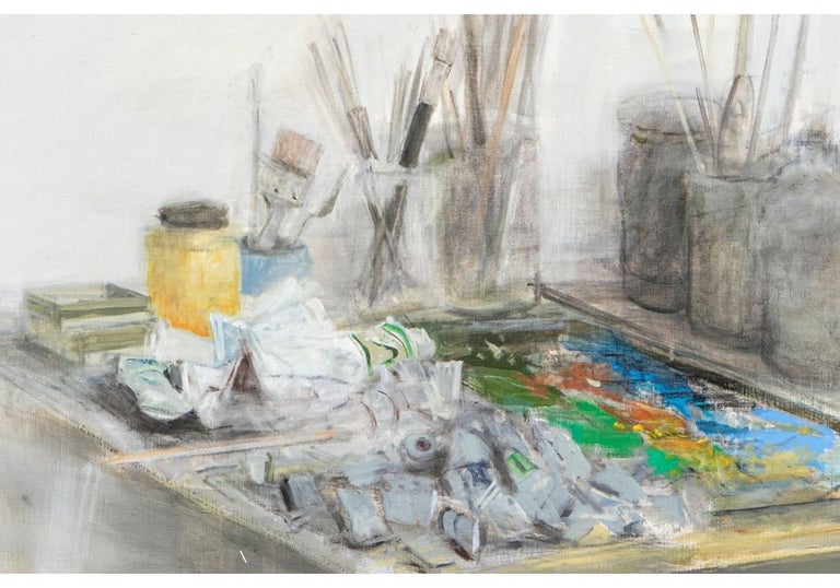 A large and important work by Turkish artist Férit Iscan depicting his artist’s supplies laid out on his work table. Signed lower right, title on verso. Paris gallery label on verso with title in French- 