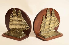 Early 20th century bronze casting bookends depicting an English pole brigantine