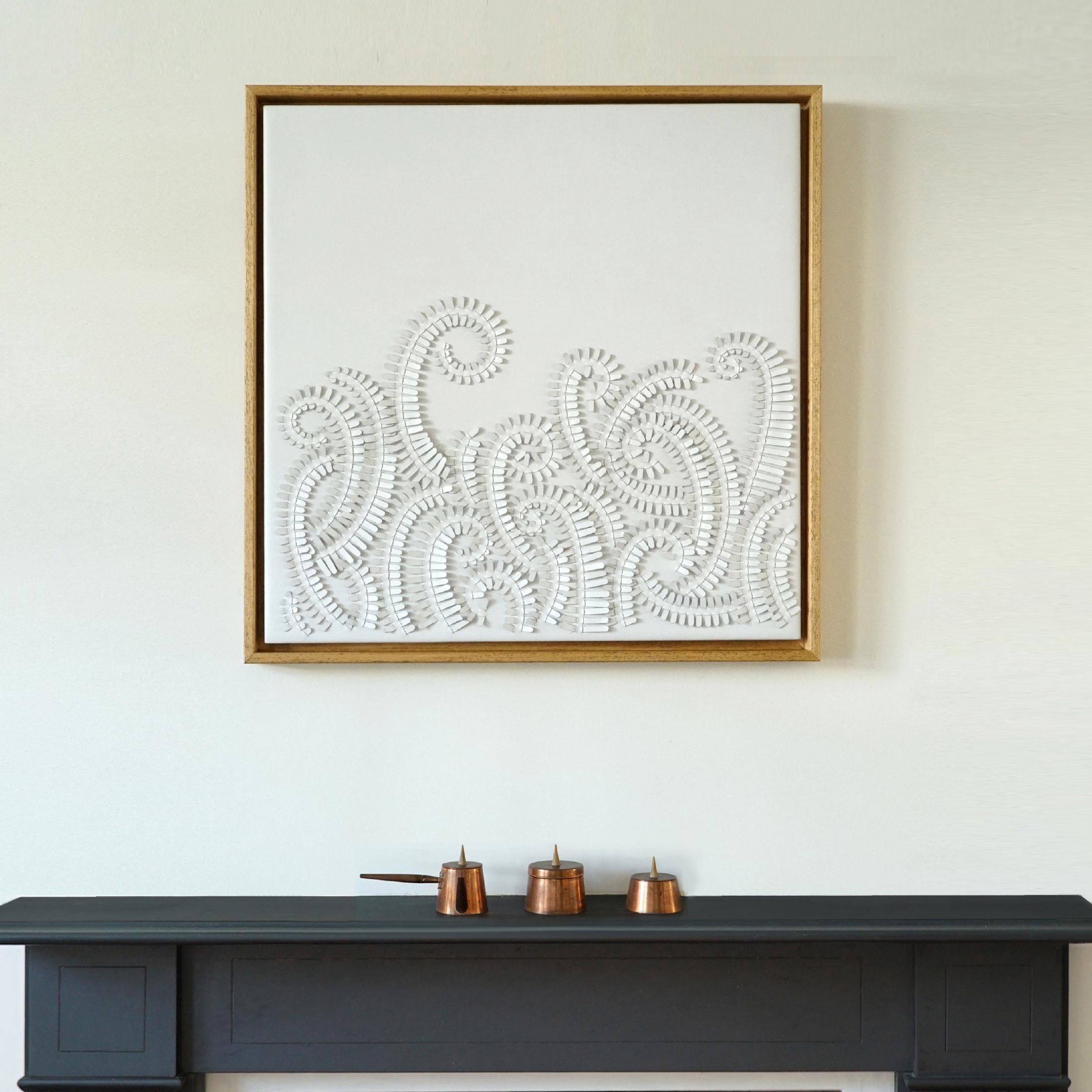 Fern:

A piece of 3D sculptural wall art designed and made from two layers of white leather, woven together by Louise Heighes.
Measurements are 25.5 x 25.5 inches or 65 x 65 cm

This piece of wall art is inspired by the way the tips of the fern curl