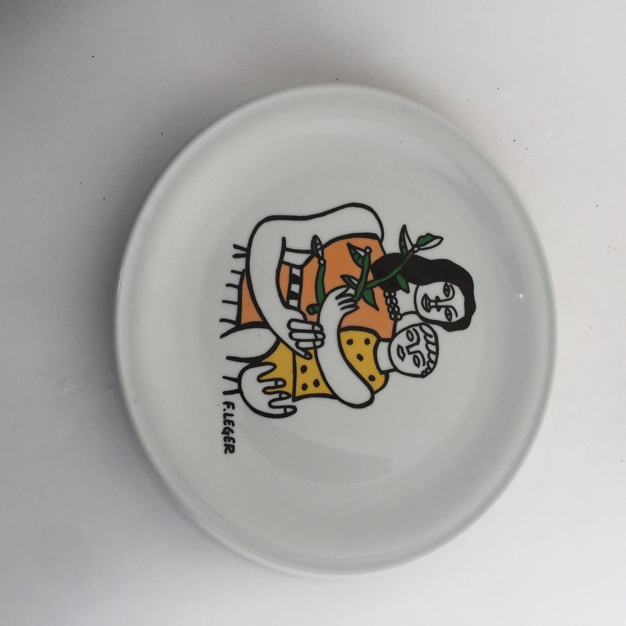 Plate with image after Fernand Leger featuring a mother and her child holding a plant. In excellent condition.