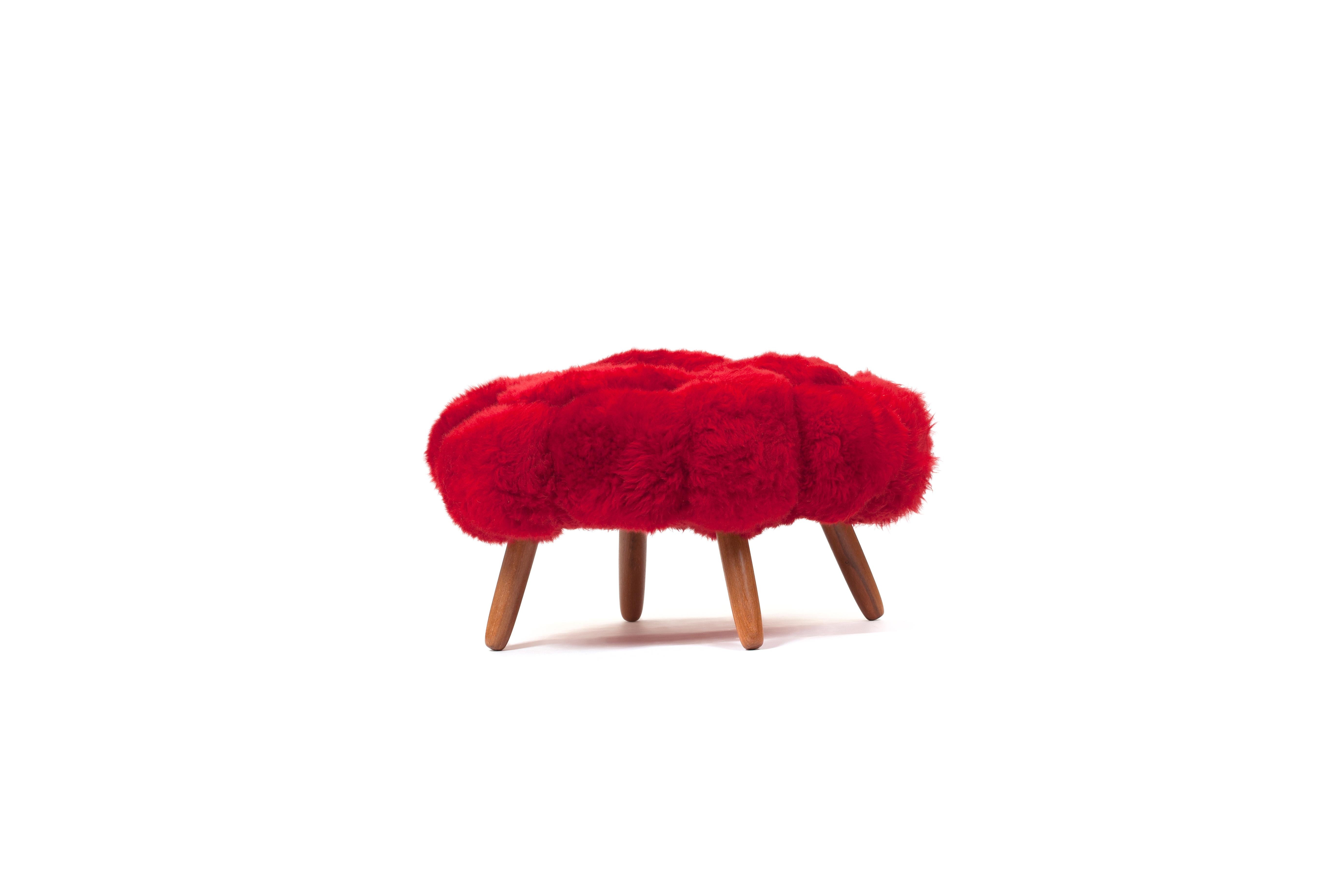 Fernando and Humberto Campana [Brazilian, b. 1961,1953]
Bolotas Puff (Red), 2018
Sheep's wool and Ipê wood
19.75 x 35.5 x 35.5 inches
50 x 90 x 90 cm
Edition of 8

Introduced during the Campana brothers’ 2015 exhibition, Artisanal, at Friedman
