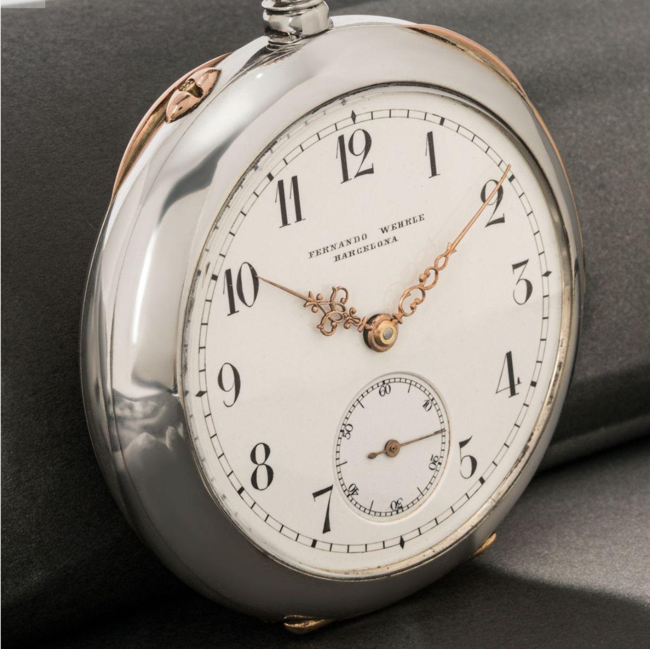 Fernando Wehrle Barcelona. A Silver and Rose Gold Keyless Lever Minute Repeater Open Face Pocket Watch C1900.

Dial: The white enamel dial signed Fernando Wehrle Barcelona with Arabic numerals and outer minute track and subsidiary seconds dial at