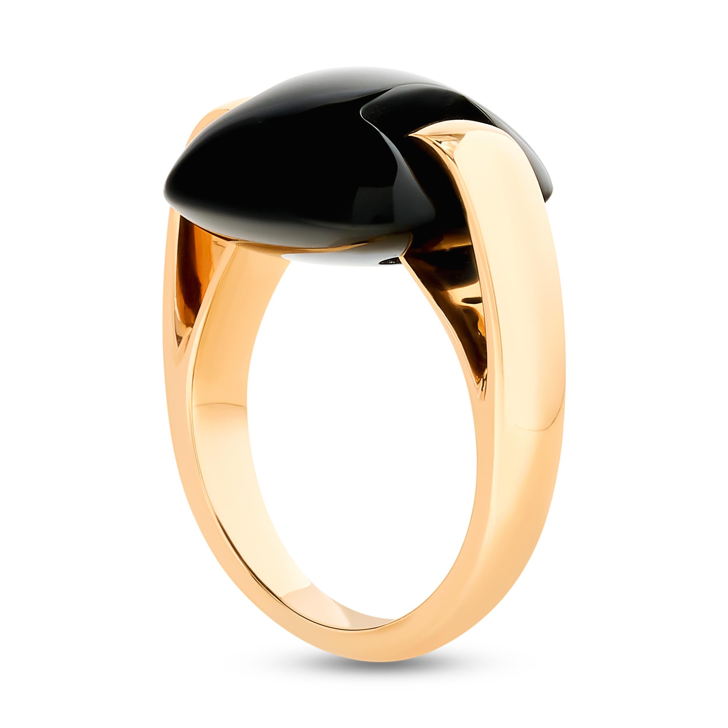 Crafted from luxurious 18k gold, the band is sleek and polished, showcasing Ferragamo's signature craftsmanship. 
The band interlocks with a black onyx gemstone.

Ring size US 4.50
Signed with the Ferragamo and 18k stamps.
Ferragamo retail: $2,200