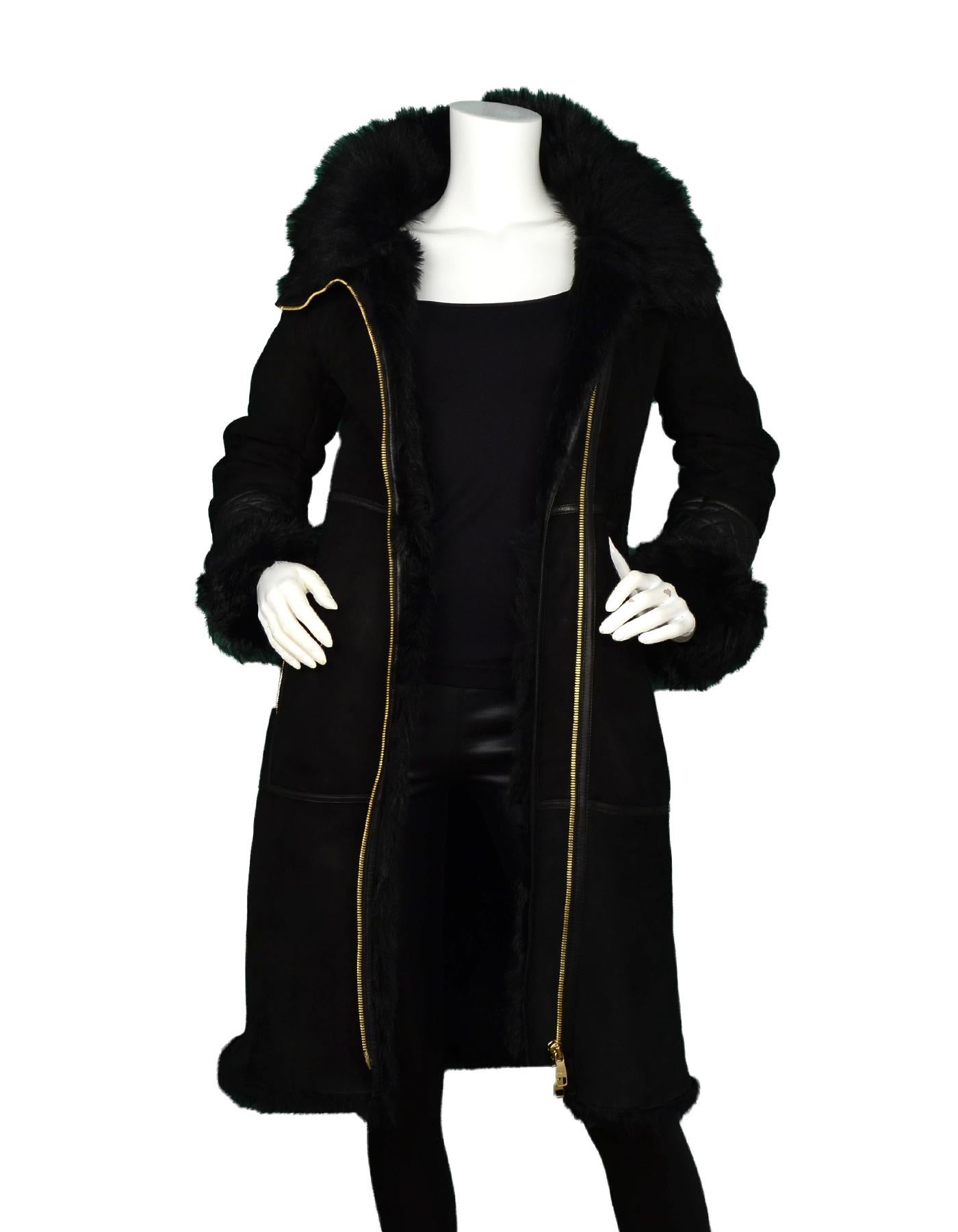 Ferragamo Black Shearling Coat W/ Quilted Leather & Fur Trim Sz US2

Made In: Italy
Color: Black
Materials: Real leather, lamb shearling 
Padding: 100% polyurethane 
Opening/Closure: Goldtone two way zipper
Overall Condition: Excellent pre-owned