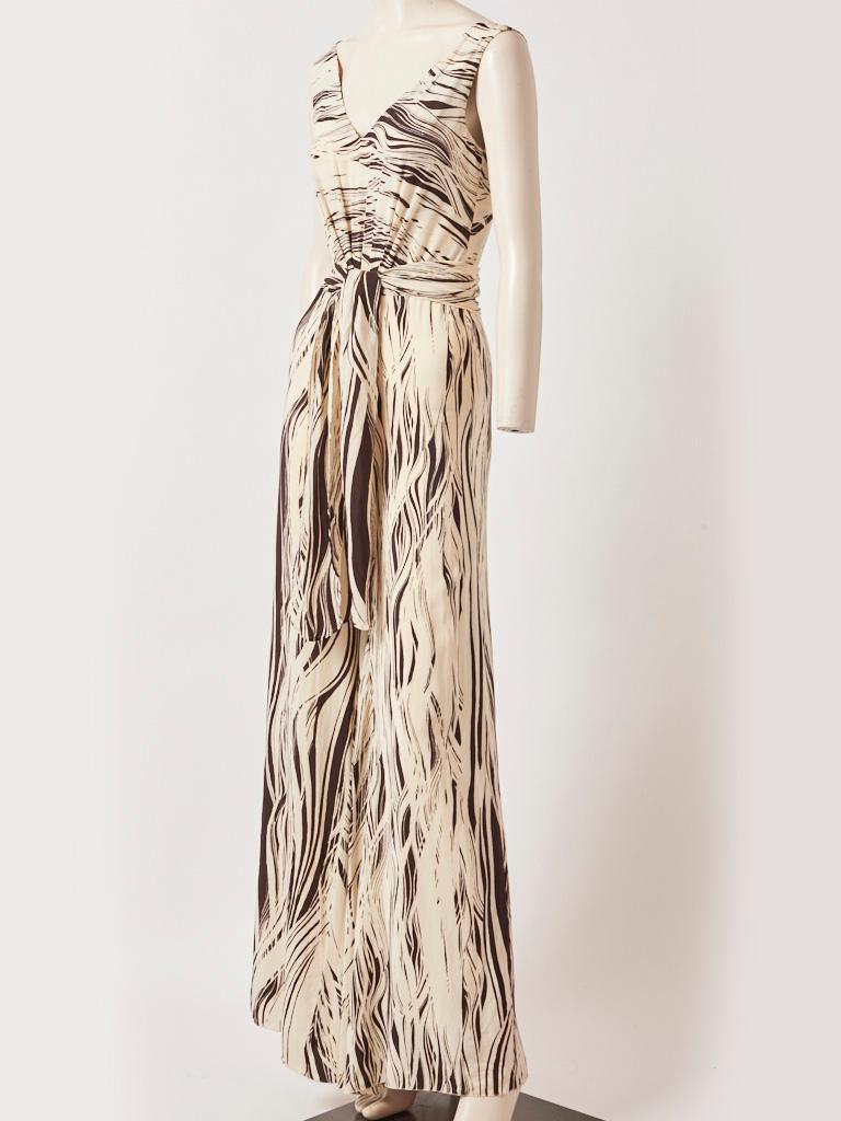 Ferragamo, brown and cream, abstract print, wide leg, sleeveless, jumpsuit, having a V neckline and an attached wide sash.