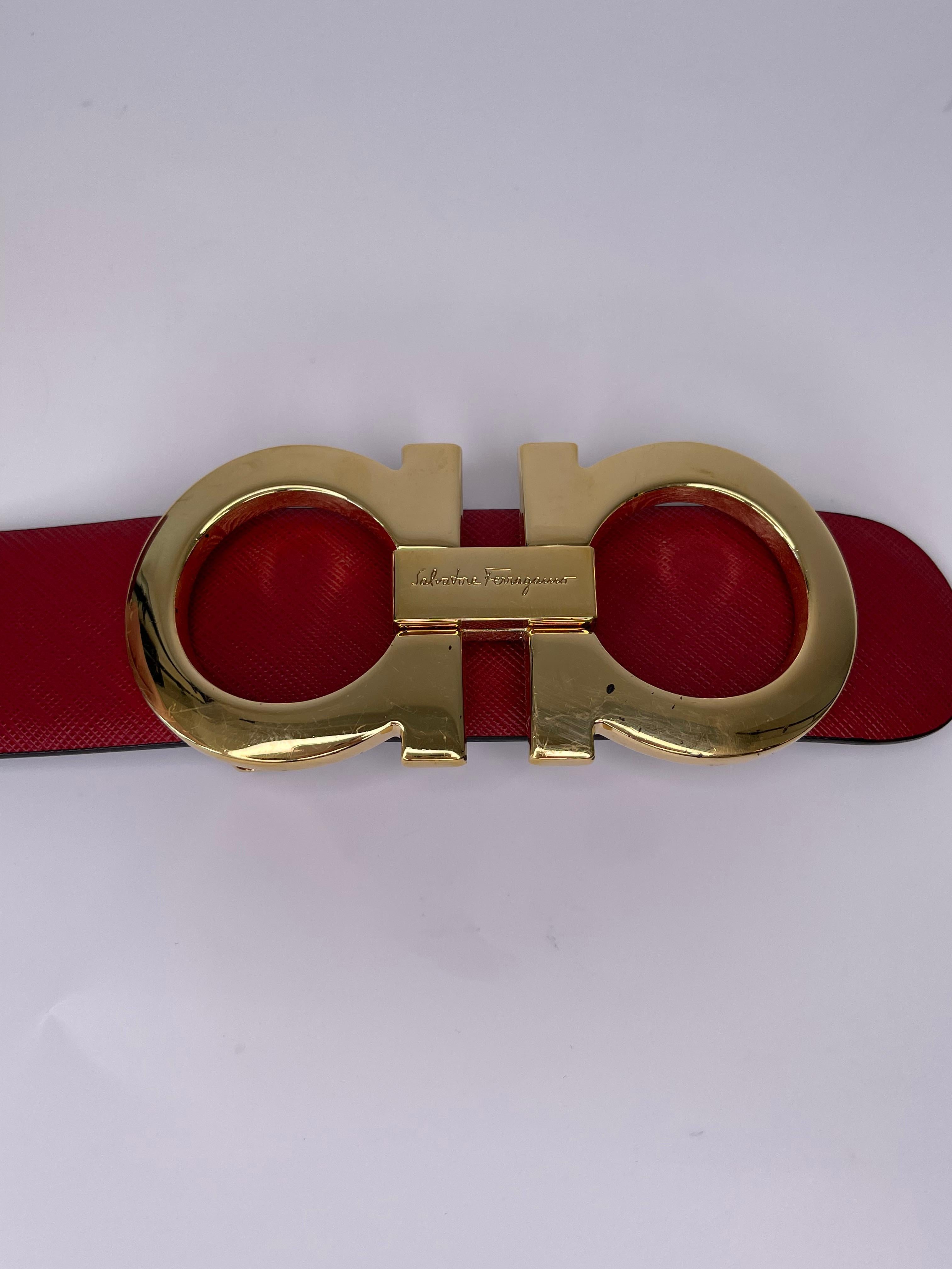 red and gold ferragamo belt