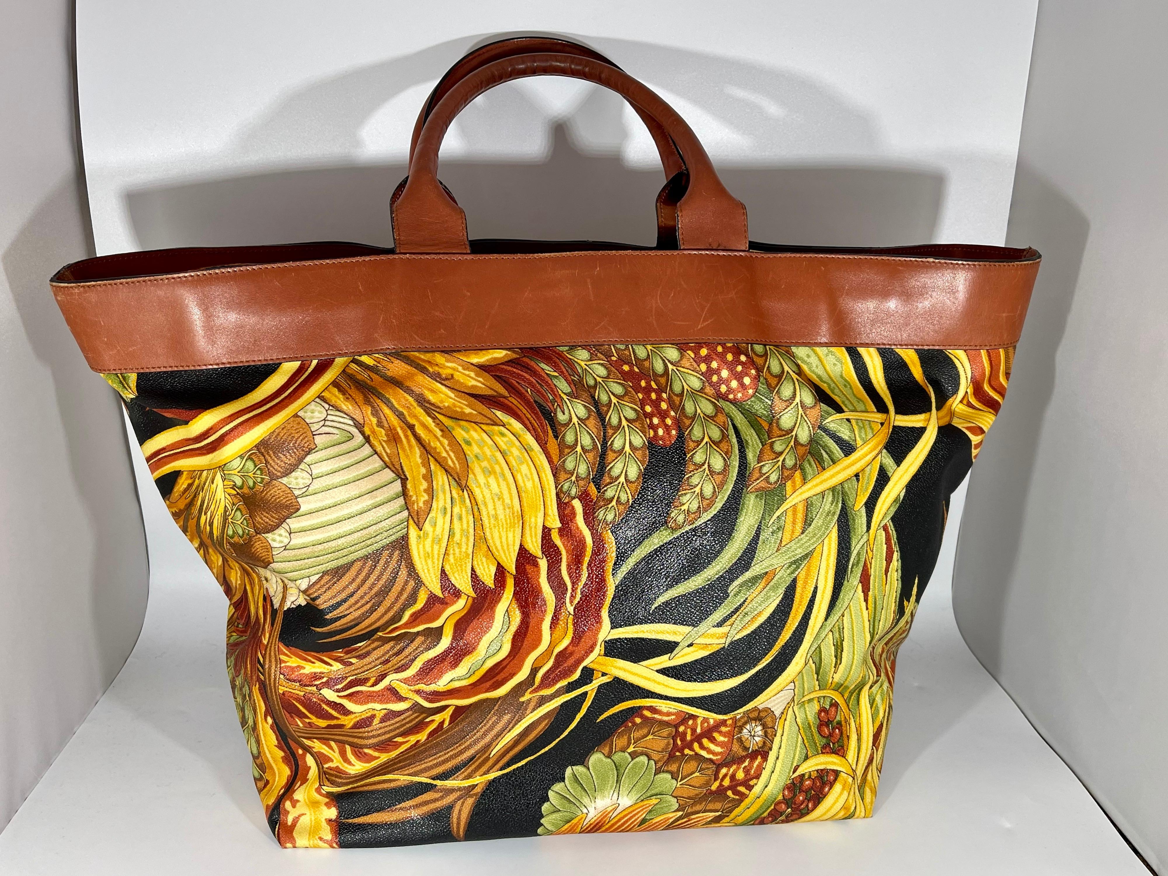 Ferragamo Travel print Tote bag Leather/Nylon Multicolor Large + matching pouch
Salvatore Ferragamo  Multicolor Large Tote Bag Shoulder Bag.

Great condition. Great bargain!
Good for beach , travel , luggage
Rare and beautiful Nylon & Leather Tote