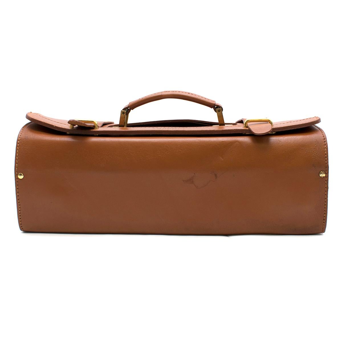 RARE FERRARI 1980-93 TOOL CASE IN TAN LEATHER

- Schedoni Leather Case & Kravm Spanner Set - missing a few tools

- Gold hardware on the handle and clasps

- Rare piece Mondial Tool Kit


