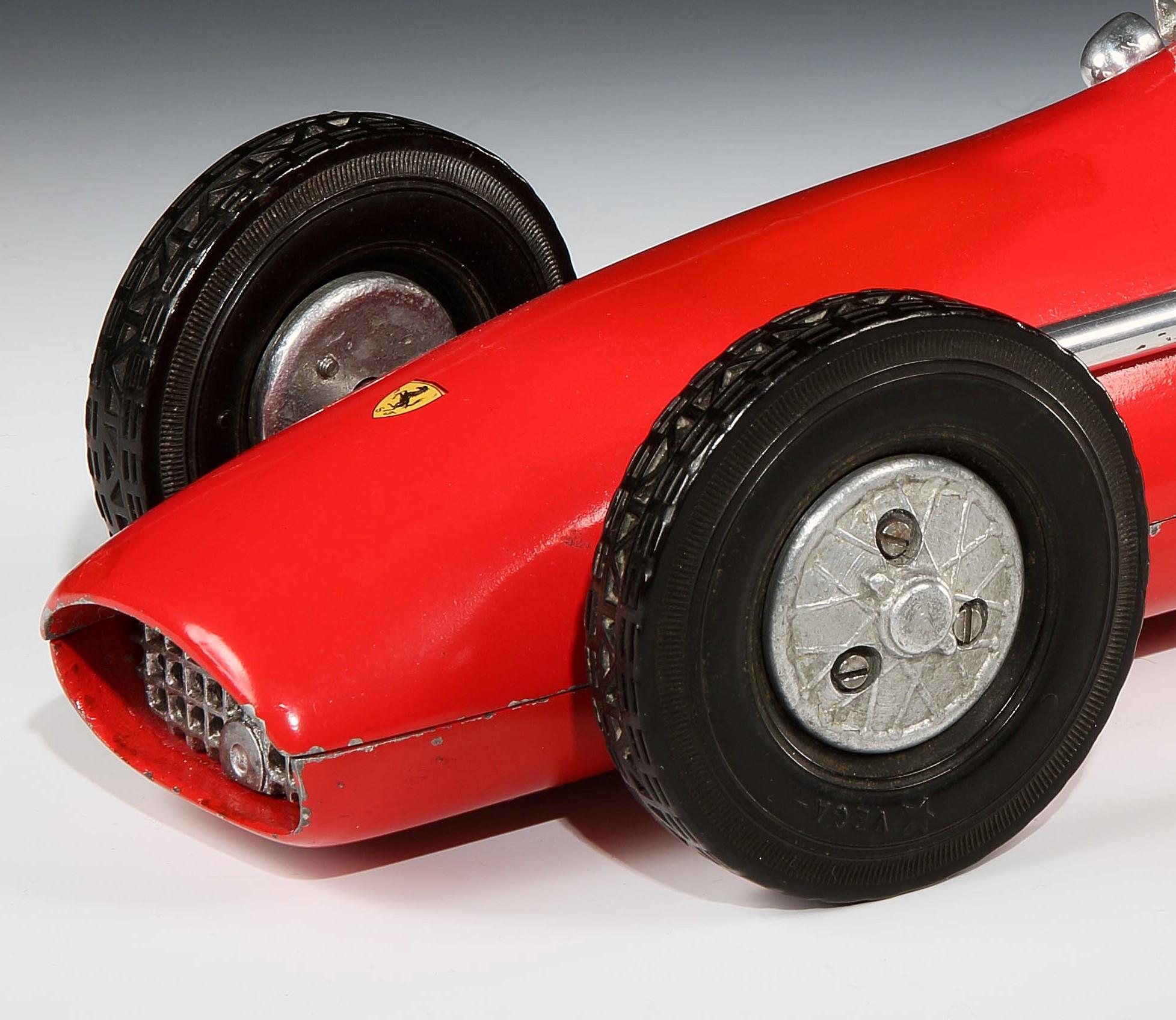 Vega: ‘Ferrari 500 F2’

An all cast, heavy aluminium pylon racer, with exhaust and hubcap detailing, with side mirrors, steering wheel and stylized ‘windshield’, powered by a rear-axel driven, 5cc glow plug petrol engine (not run, but capable of