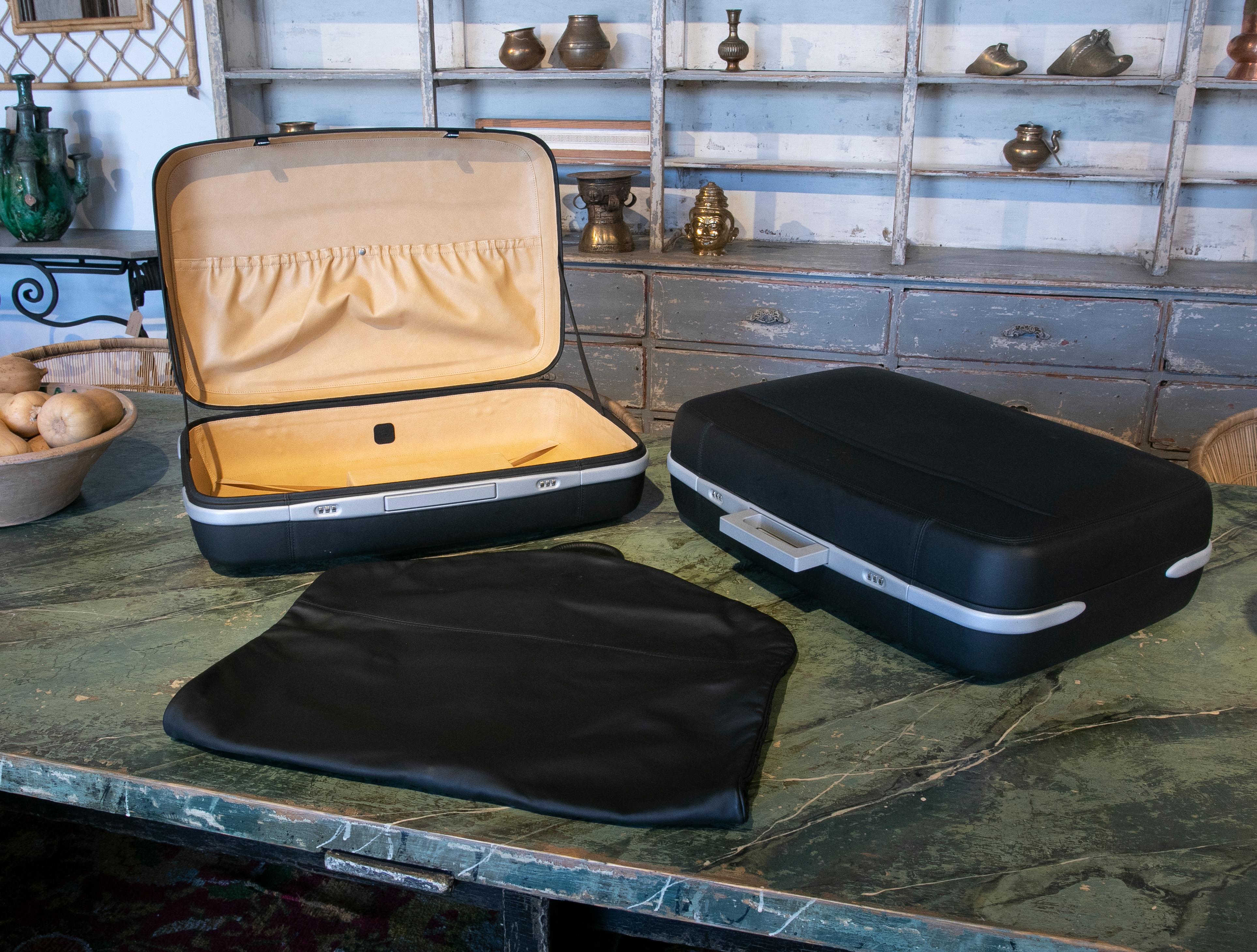 Ferrari suitcase set manufactured by Schedoni in black leather and aluminum
Brand New with Original Cases.