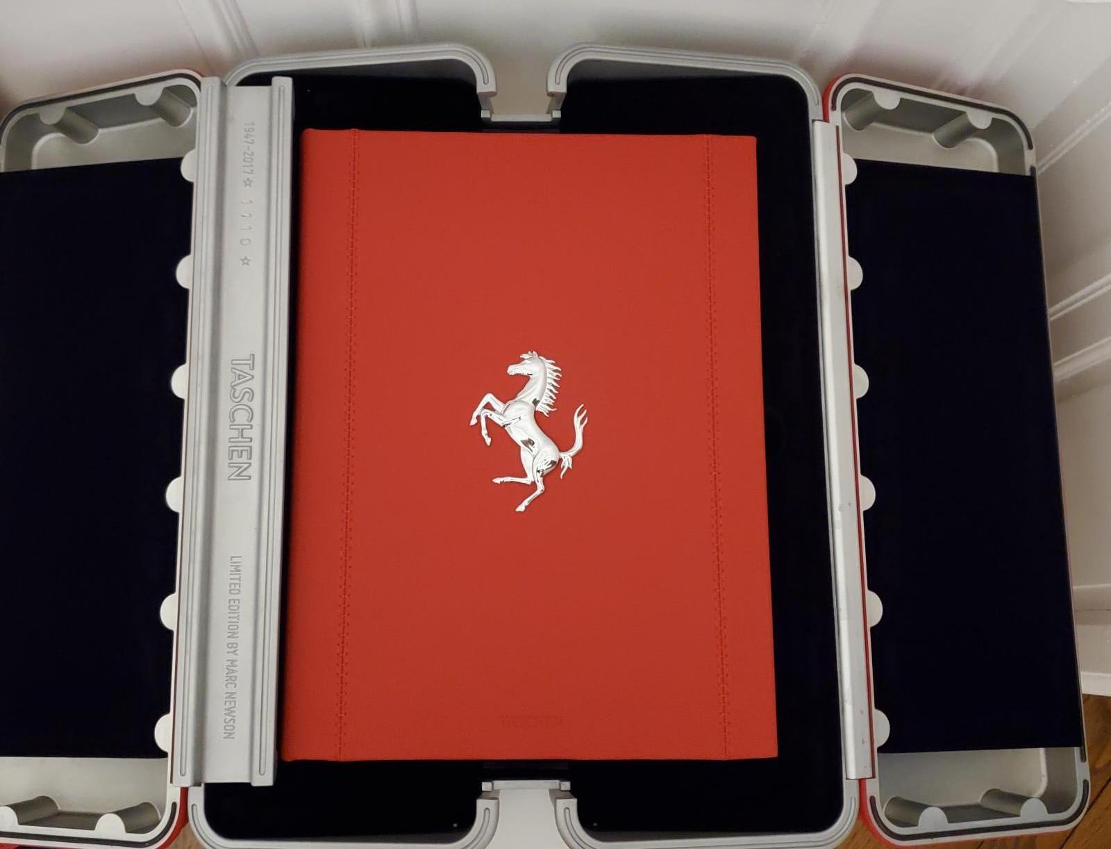 Taschen ferrari tabble book

its a wonderfull object that is imposing and bold with its Ferrari Red color
a must have for any car collector and book collector 
very beautiful and specially for the price its a steal.
the outside is made from