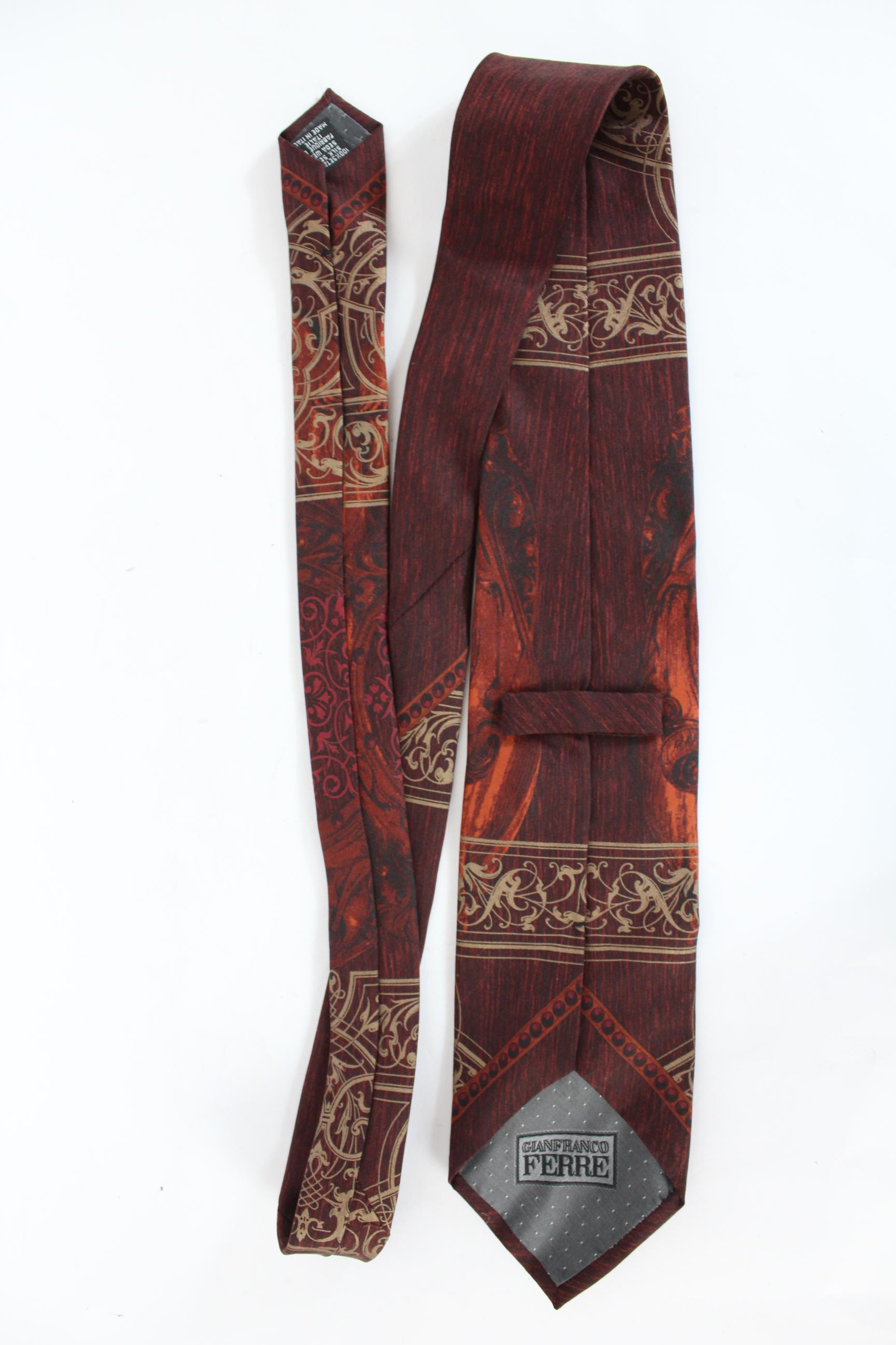 Gianfranco Ferre vintage 80s tie. Red and beige color with floral designs. 100% silk. Made in Italy. Excellent vintage condition.

Length: 143 cm
Width: 9 cm