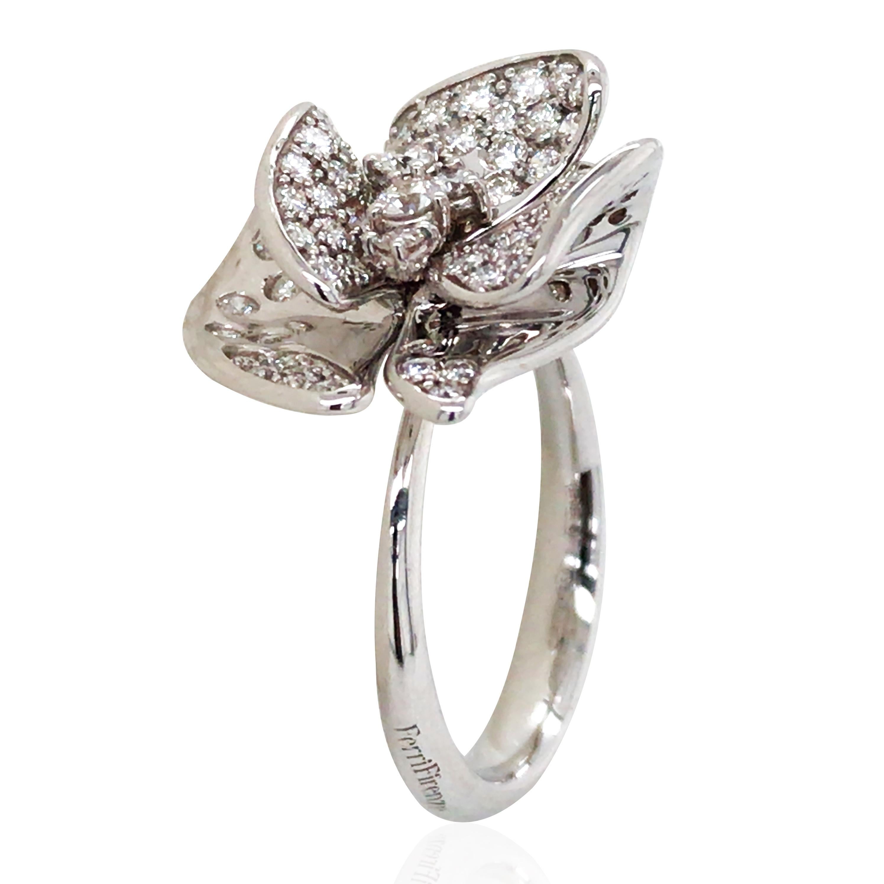 This Ferri Firenze ring perfectly blends fashion and elegance, with a design inspired by delicate flowers. The ring is set with approximately 0.93ct of diamonds, radiating brilliance and providing the wearer with unique charm. Crafted in 18K gold,