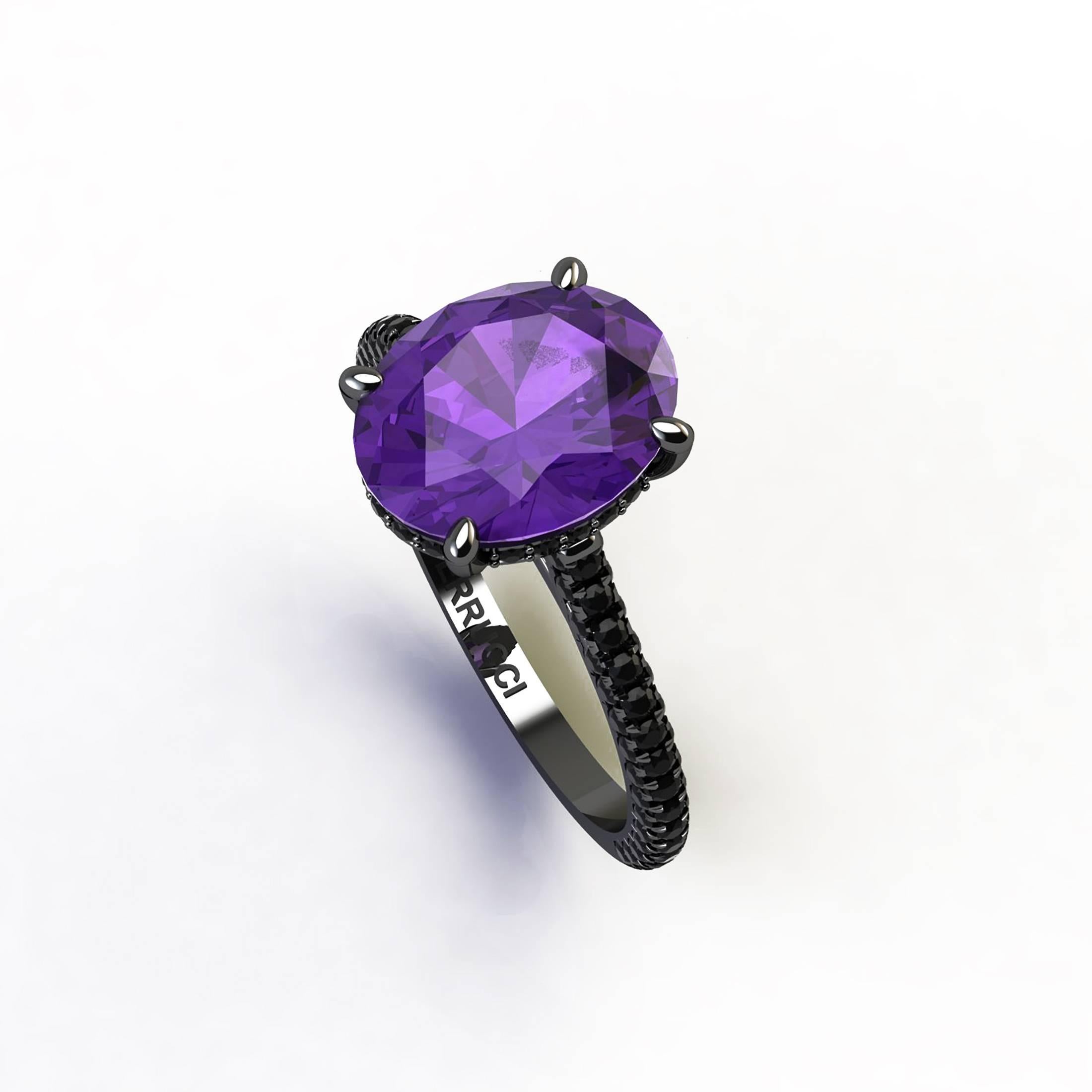 Natural Purple Oval Amethyst, hand cut in Oval cut shape, clean and pure gem, conveiced in an hand made 18k gold Black Rhodium cocktail ring,
adorned with a shower of Black Diamonds, hand set, on almost every surface of the ring, to give the maximum