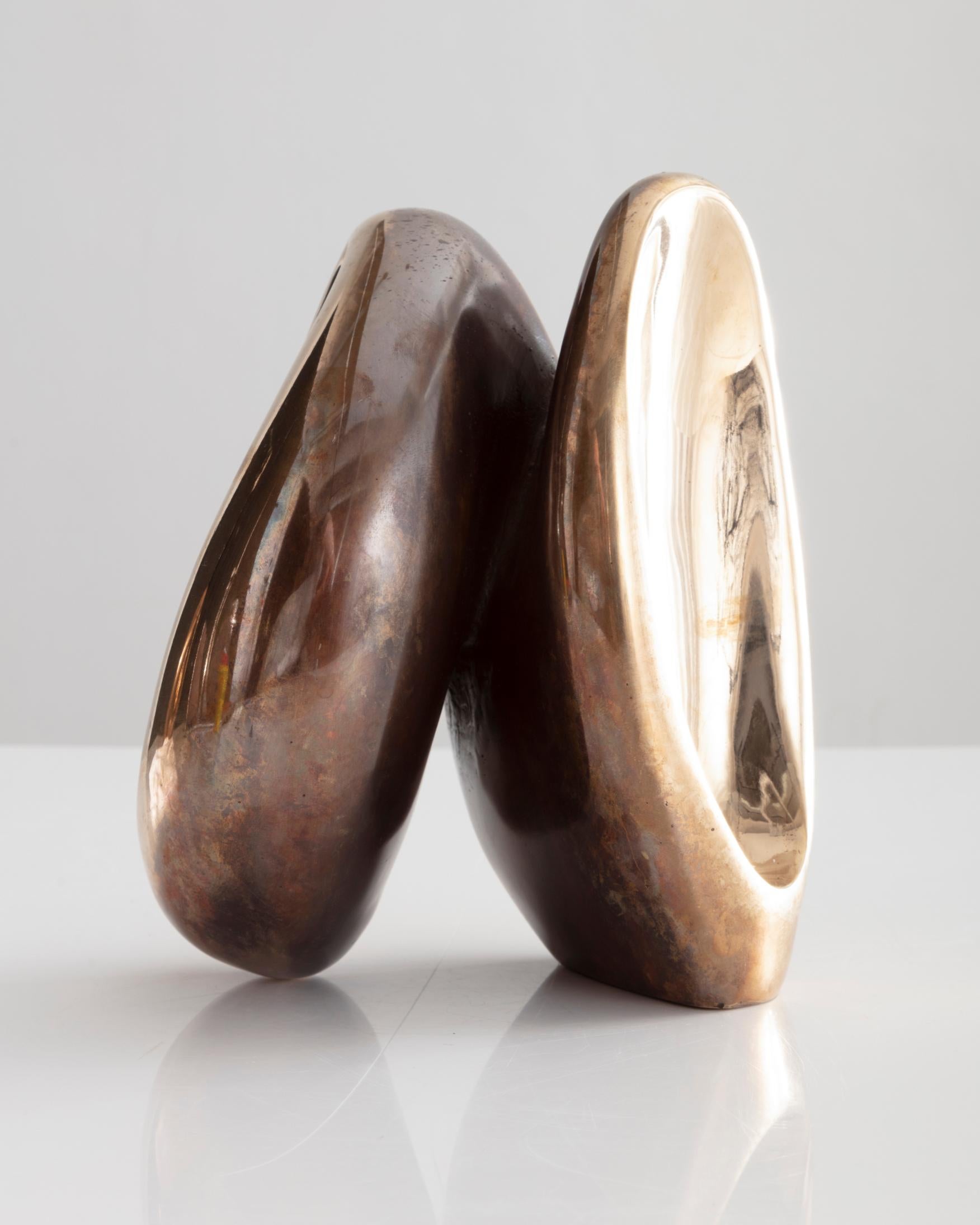 Fertility form double candleholder in cast, patinated, and polished bronze. Designed and made by Rogan Gregory, USA, 2018.
      