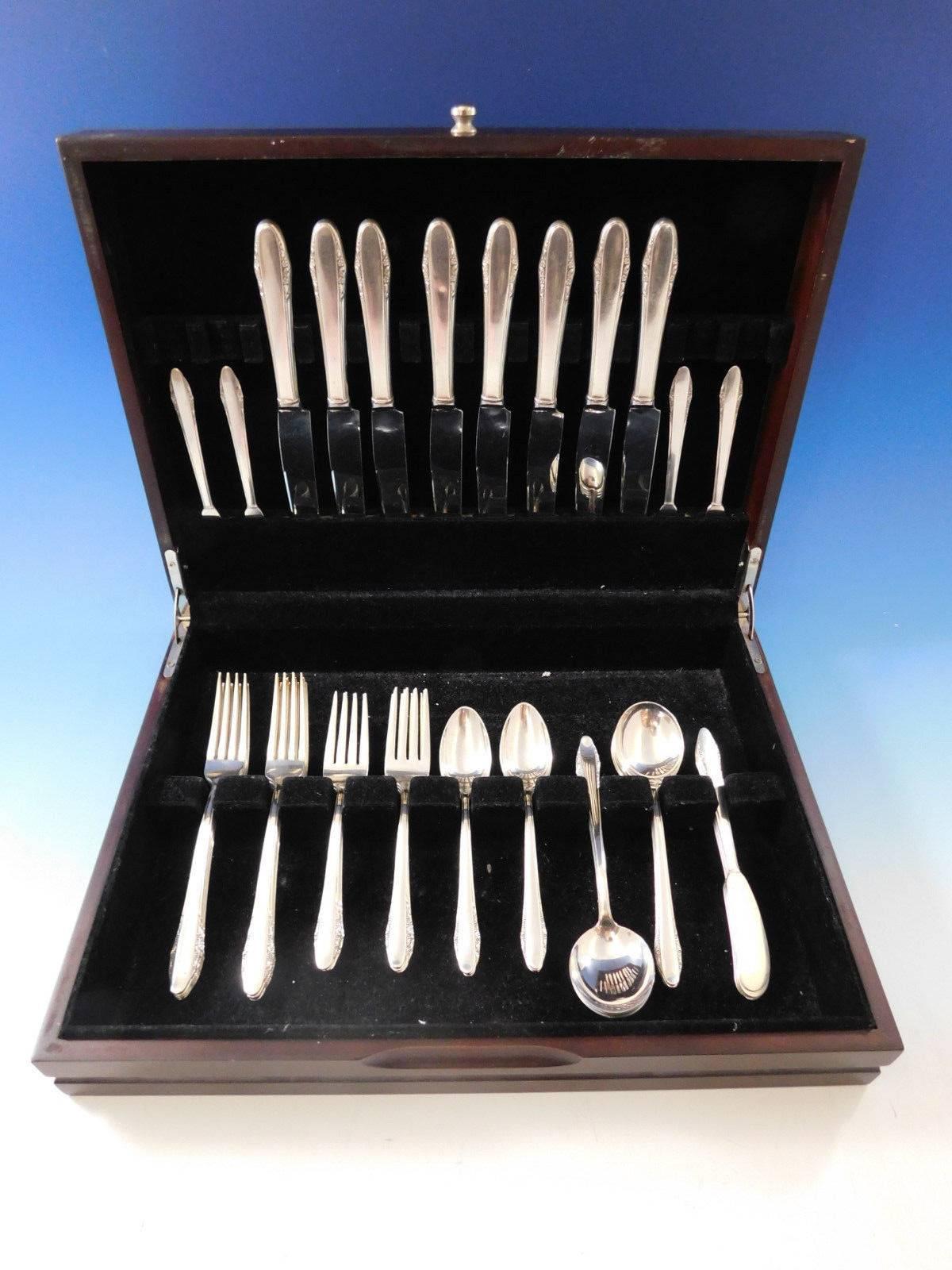 Festival by Lunt circa 1936 sterling silver flatware set, 48 pieces. This set includes:

Eight knives, 8 7/8