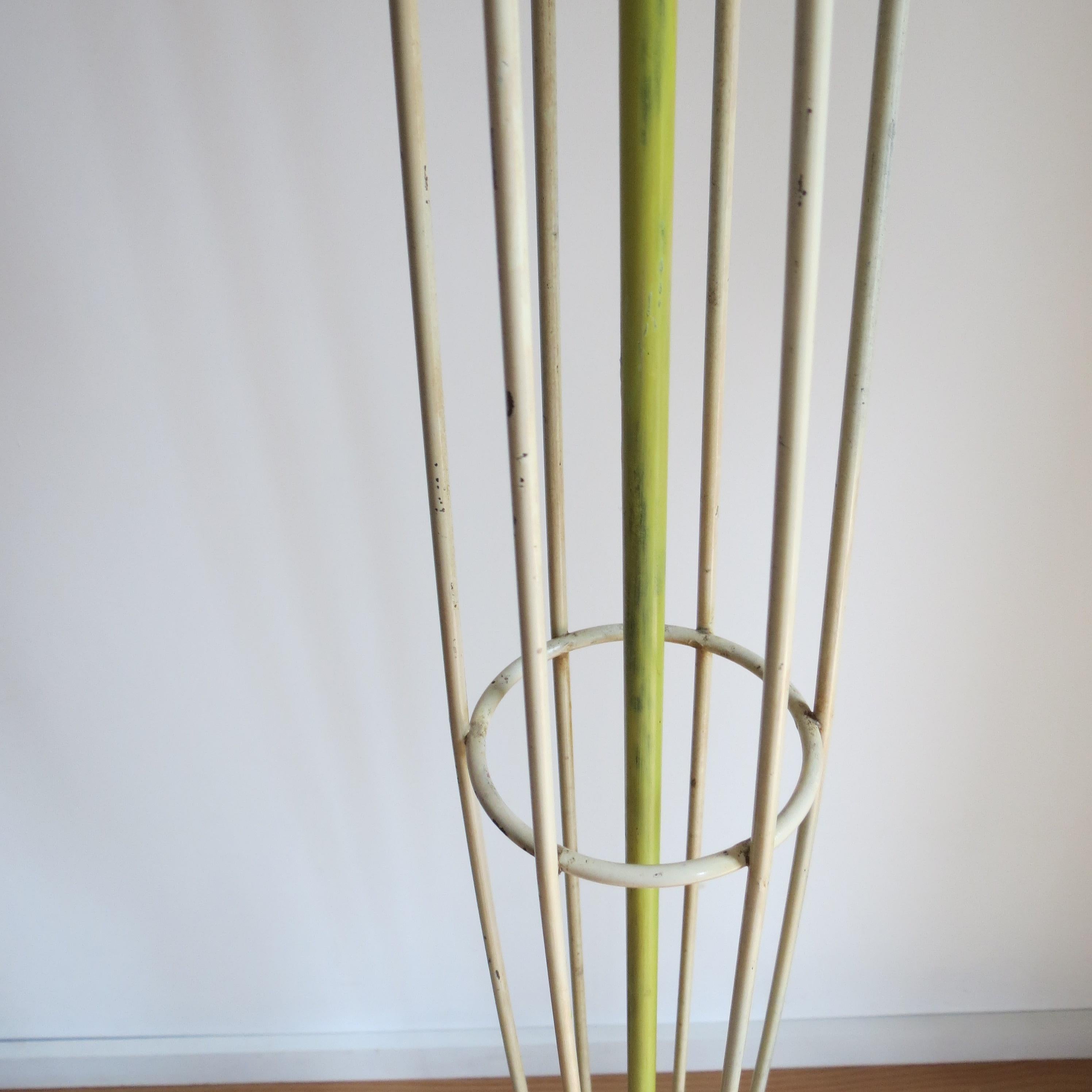 A wonderful and rare Festival of Britain Skylon floor lamp, dates from 1950s
The lamp is exact copy of the shape of the Skylon. Made from painted metal rod with wooden ball feet.
Retains the original paint, which shows signs of loss and