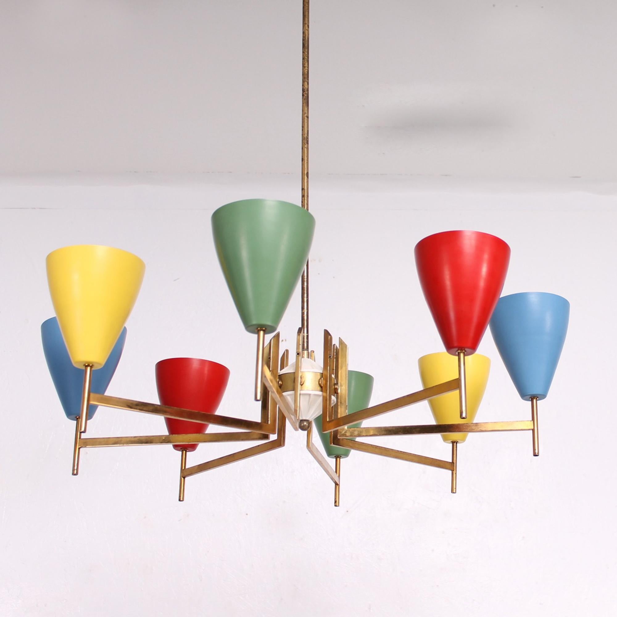 1950s Italian colorful Chandelier Pendant Lamp made in Italy.
Brass body with eight vibrant colors that scream fun!
Aluminum Shades of red green yellow & light blue.
It requires eight E-14 bulbs, not included.
No stamp. Attributed to Arredoluce.
28