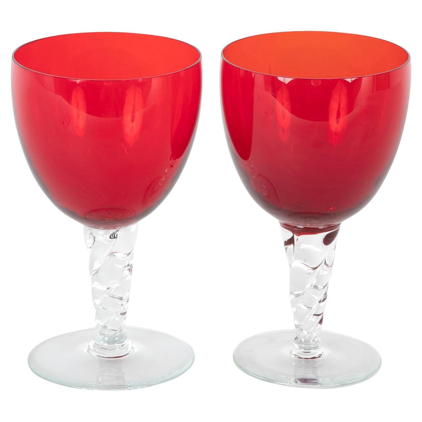 Festive set of 12 red crystal with clear stem goblets. Made in the USA.