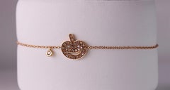 Festive Shine: 18kt Gold Bracelet with Diamond-Studded Pumpkin