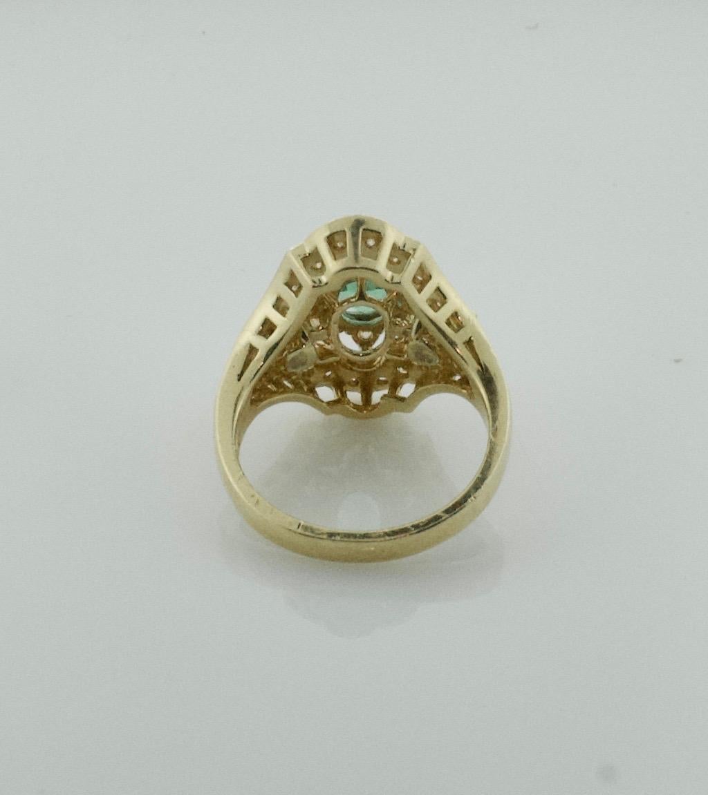 Fetching Emerald and Diamond Ring in Yellow Gold Emerald 1.35, Diamonds .90 In Good Condition For Sale In Wailea, HI