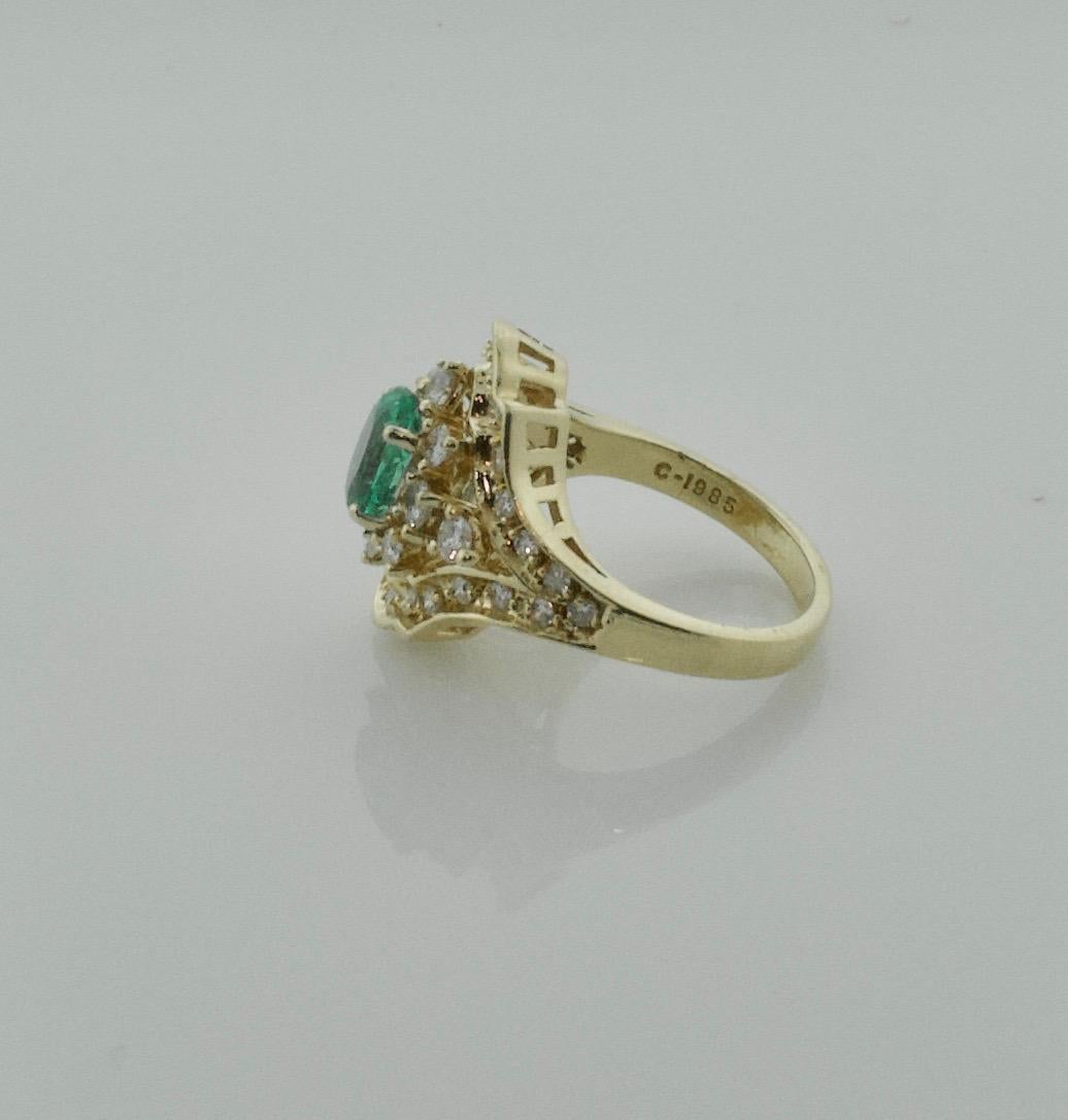 Women's or Men's Fetching Emerald and Diamond Ring in Yellow Gold Emerald 1.35, Diamonds .90 For Sale