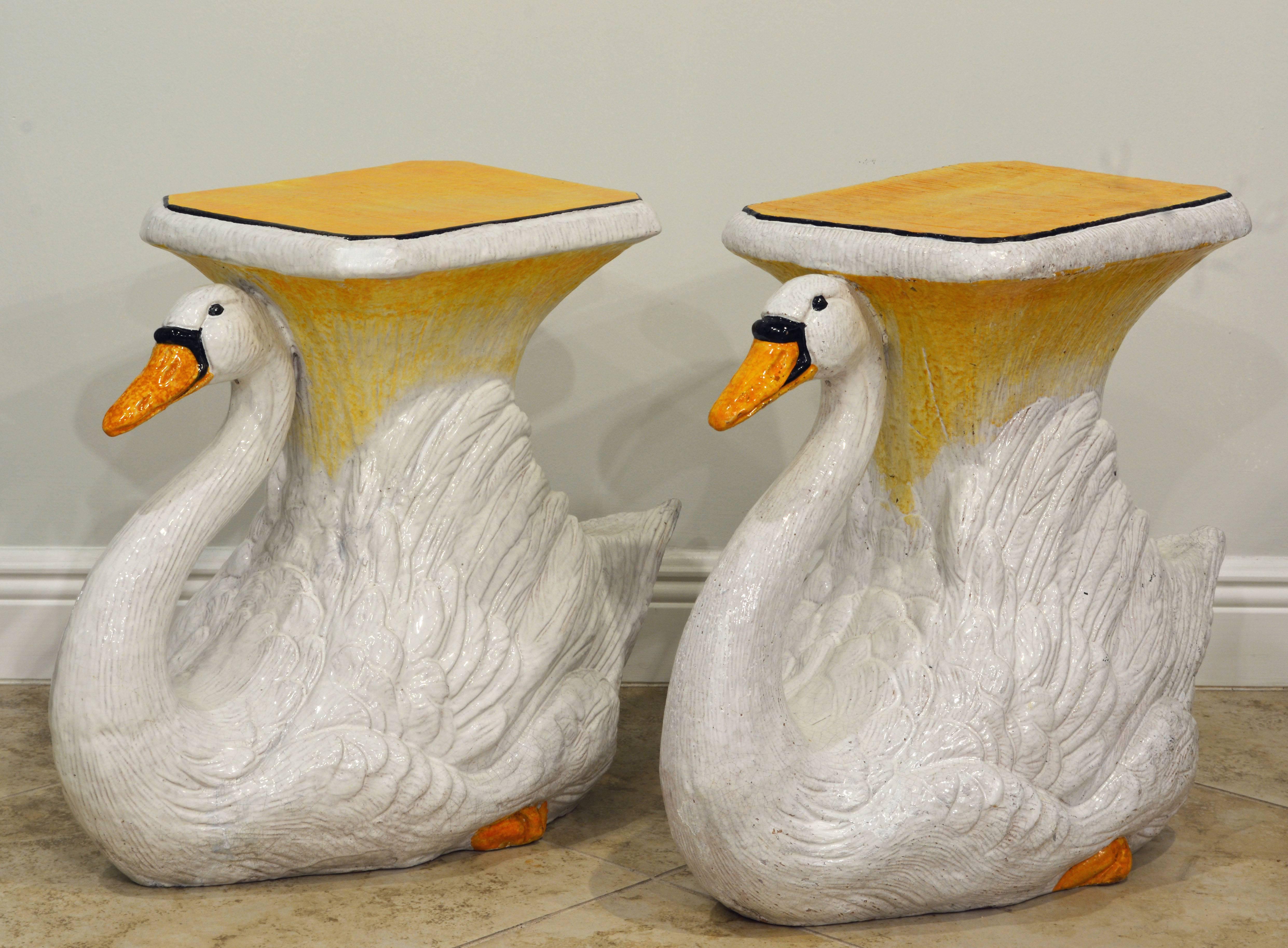 Made in the classic Italian way of glazed terracotta these garden seats in the shape of lifelike swans with yellow seats and orange beaks and feet make a wonderful impression. The swans are well modeled with lots of detail and will be suitable both