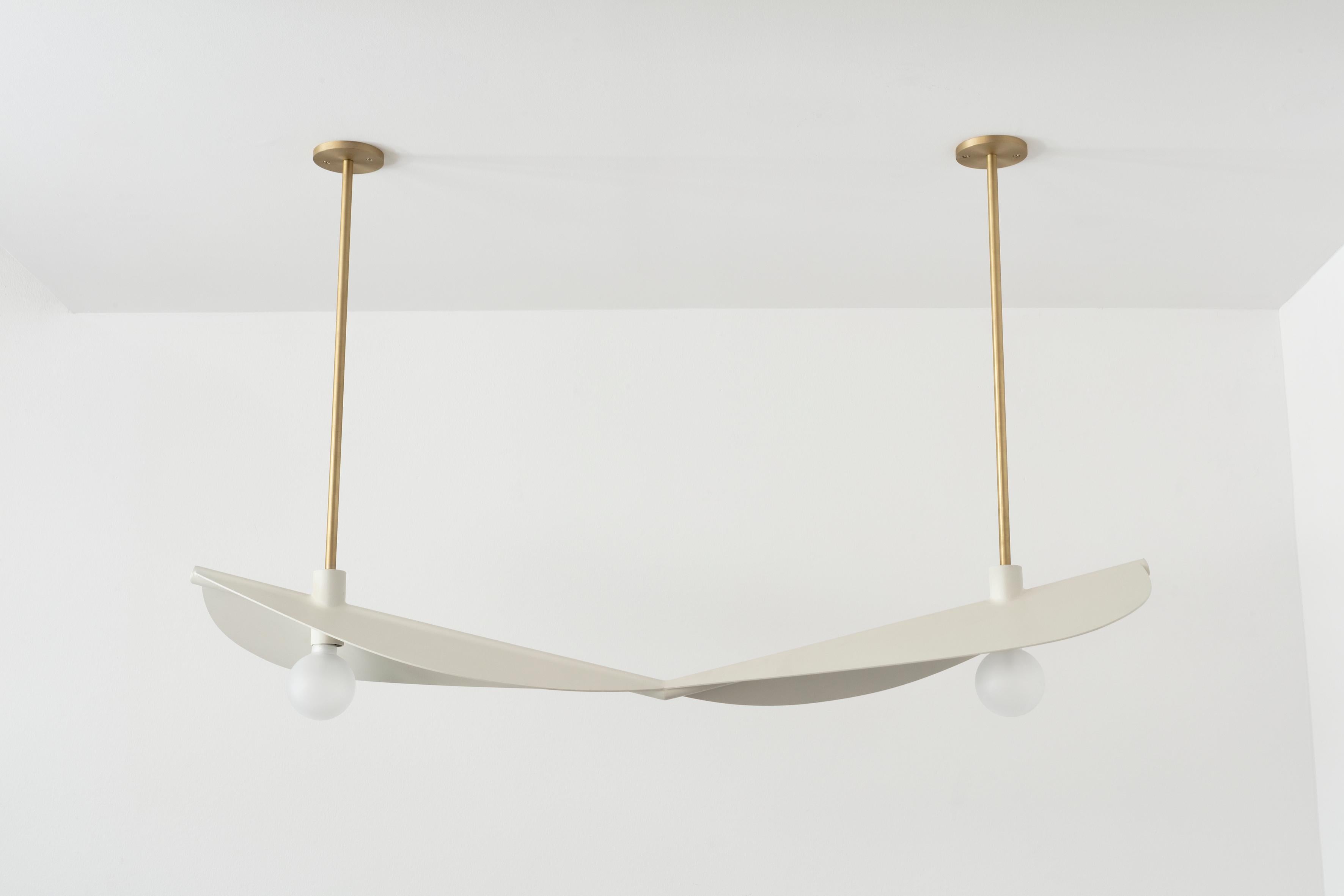 Feuillage duo ceiling mounted, white - Carla Baz
Dimensions: L 140 x W 30 x H 80 cm
Weight: 10 kg
Material: painted steel, brass

Feuillage is a lighting installation composed of fine metal leaves delicately welded on a branch holding frosted