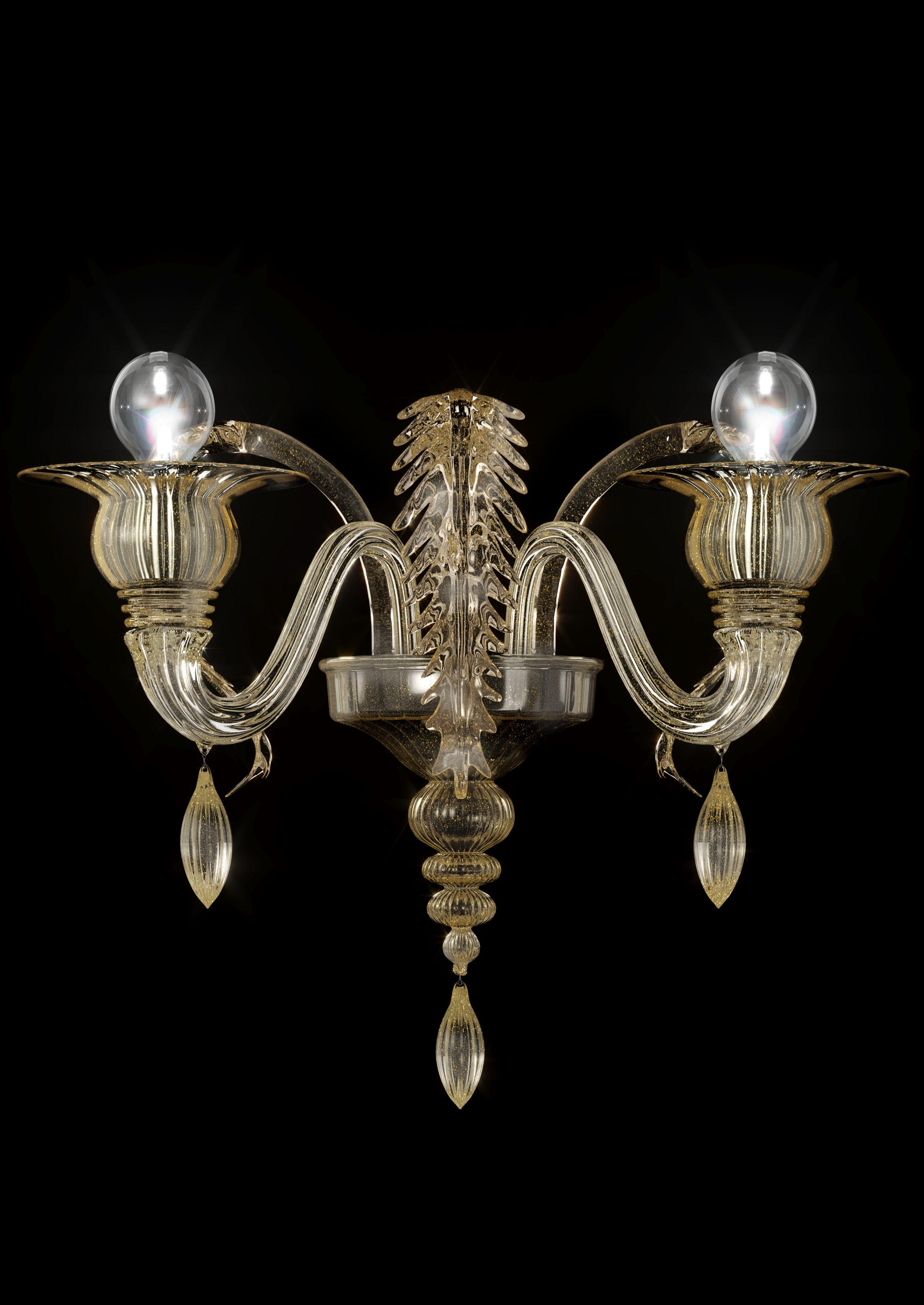 The Fez 5602 02 wall sconce was originally designed in 2011, and is shown here with 2-lights, gilded gold blown glass, and a galvanized gold finish. The gilded leaves and olive pendants feature in this collection of chandeliers and wall sconce with