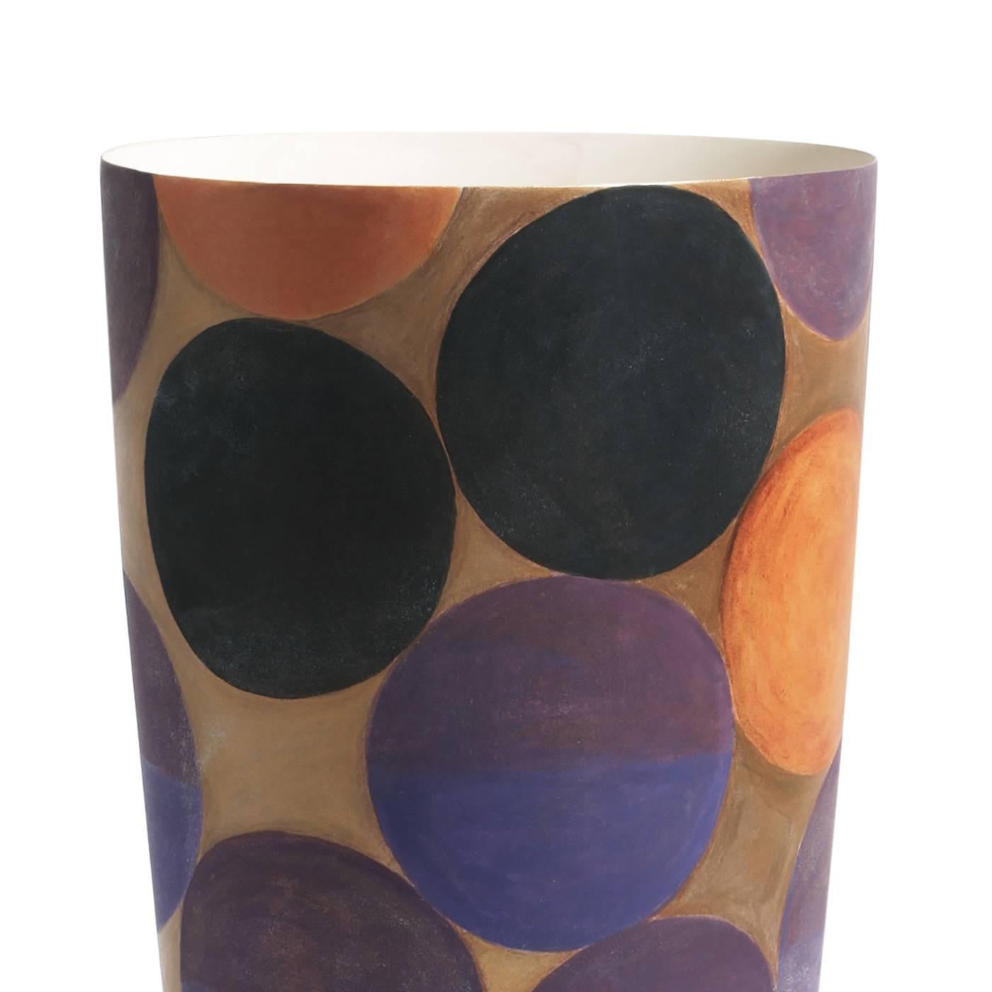 Colorful and playful, this ceramic vase belongs to a limited edition of 50 pieces that were all hand-painted. The simple conic shape of the vase is enriched outside with a series of multicolored large dots in purple, pink, blue, and black almost