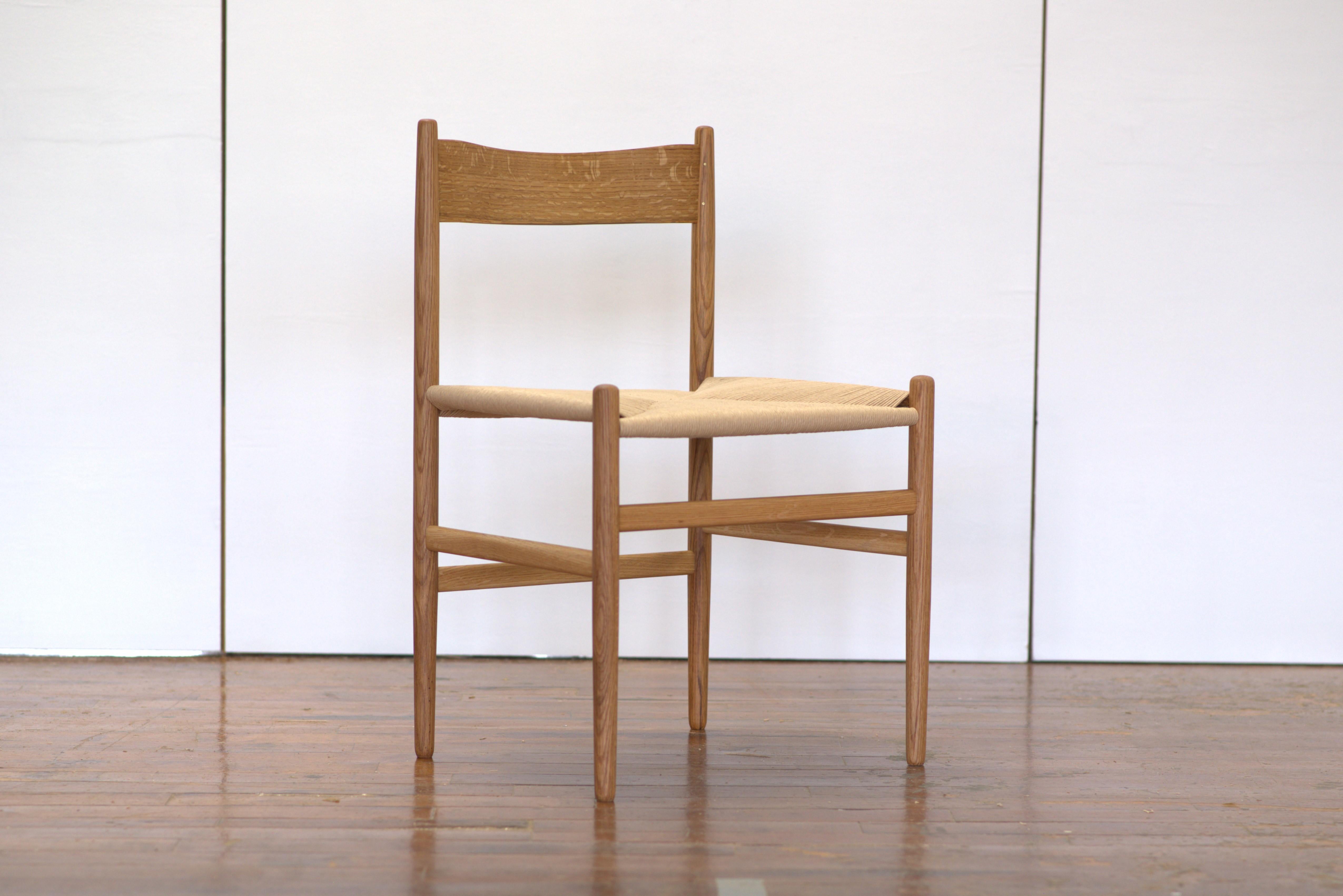 Inspired by simple Shaker chairs and Danish designers’ interpretations of the same chairs. The legs are turned simply, widening at the centering to accept the mortise and tenon joinery of the consistently shaped stretchers. 

Distilled to its